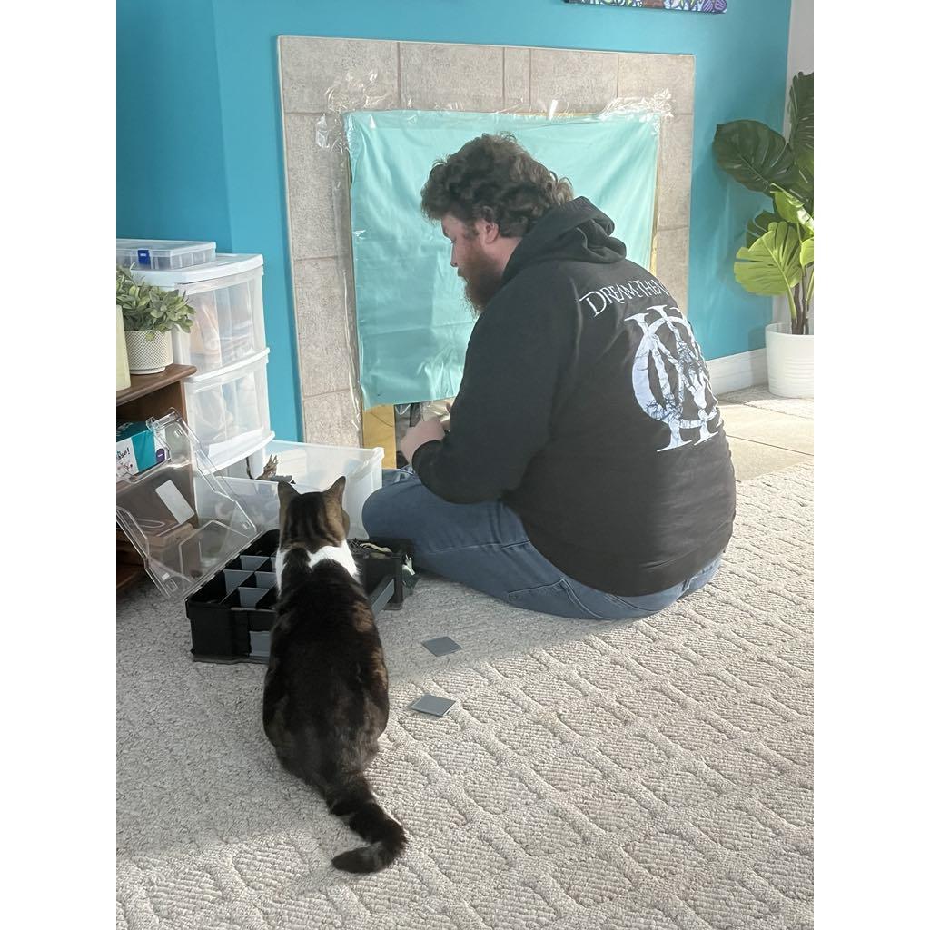 Phil & his step-daughter Polly, always lending him a helping paw