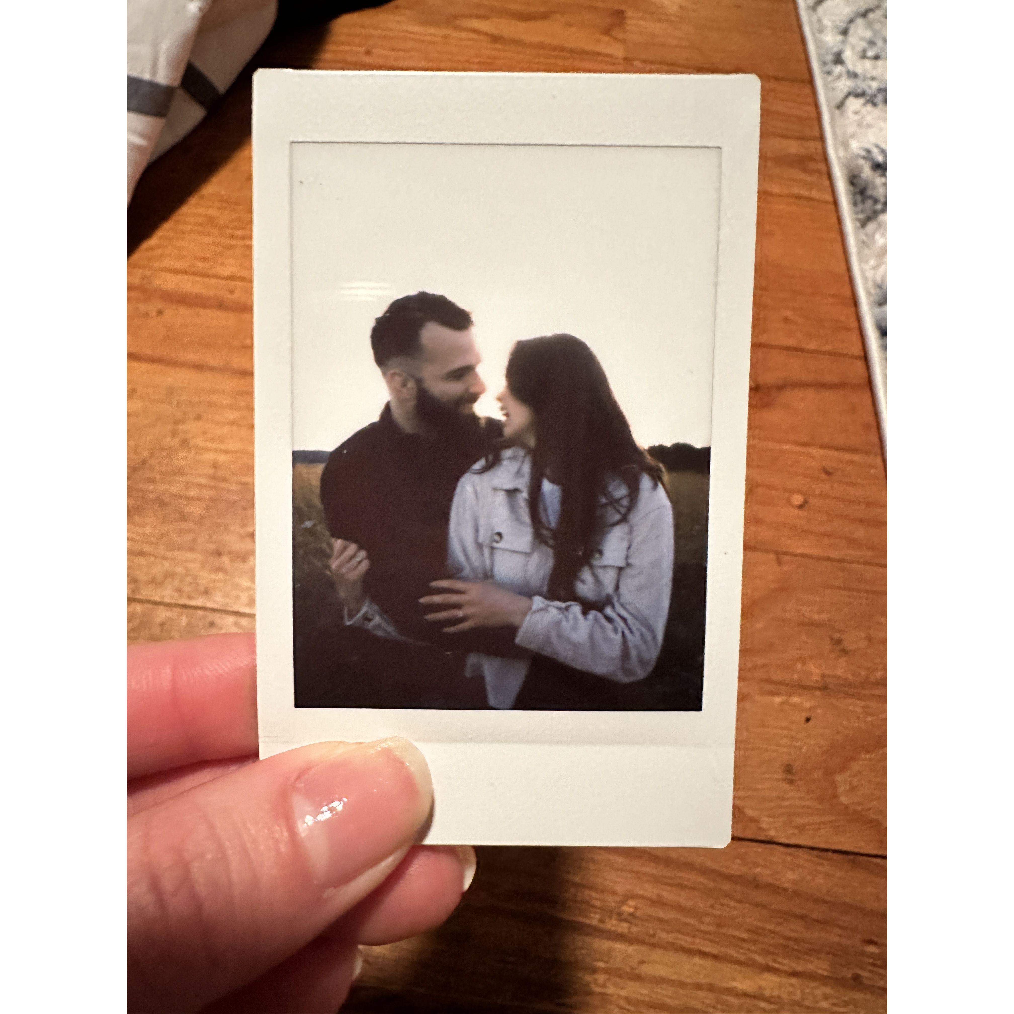 One of our Engagement Photos by Sara Bargo! Have to have a classic Polaroid to capture the photoshoot