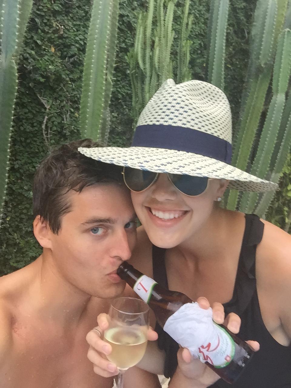 Drinking beers to celebrate making it to the top of the volcano