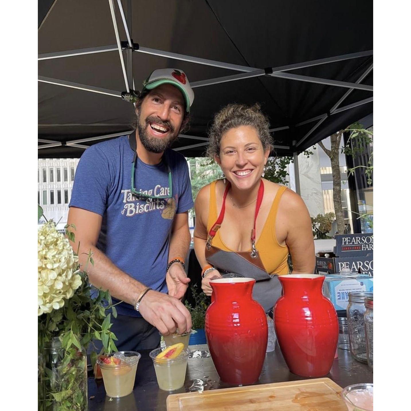 We love working together (bartending at PeachFest)