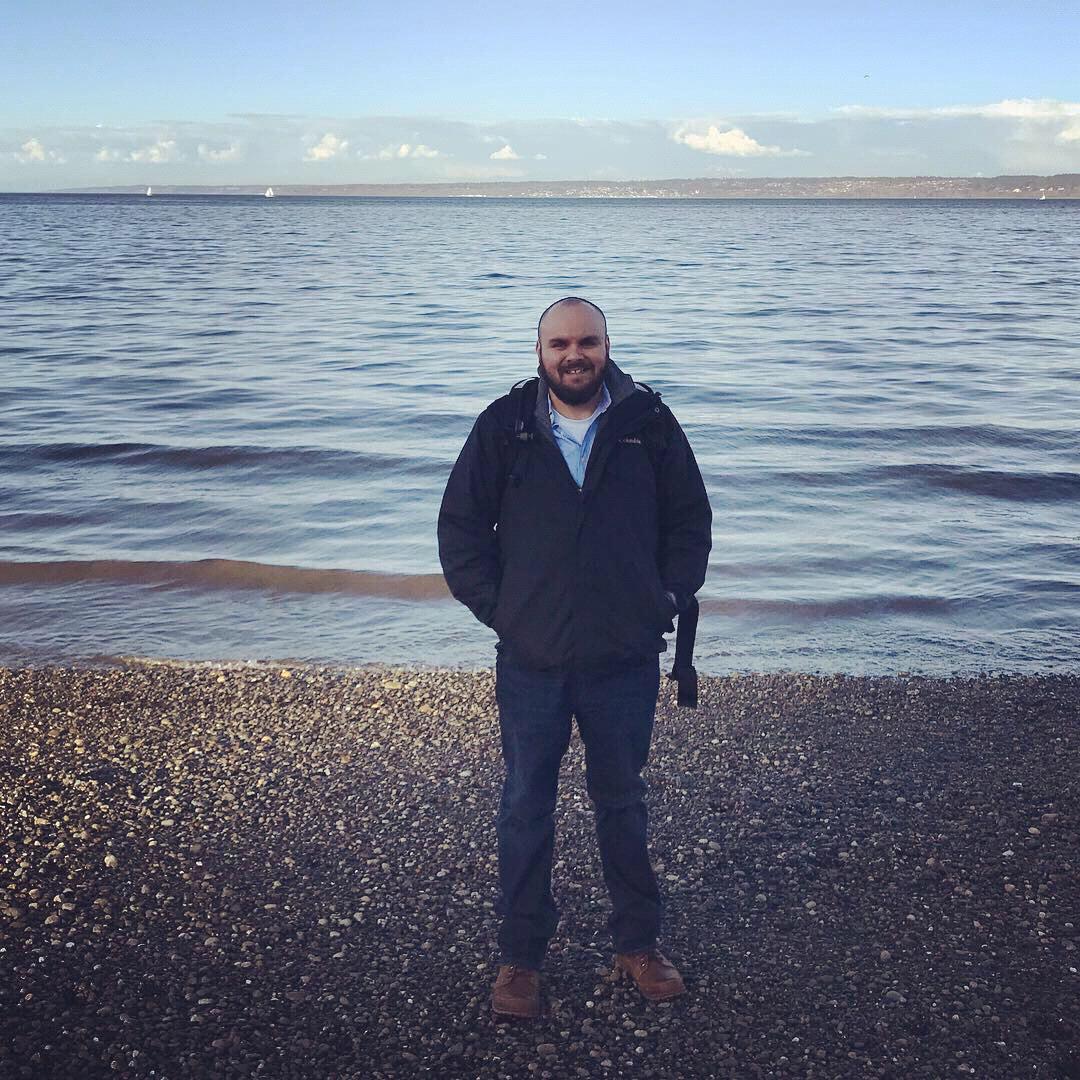 Bainbridge Island, WA - Selek attempts to teach Erin how to skip rocks.