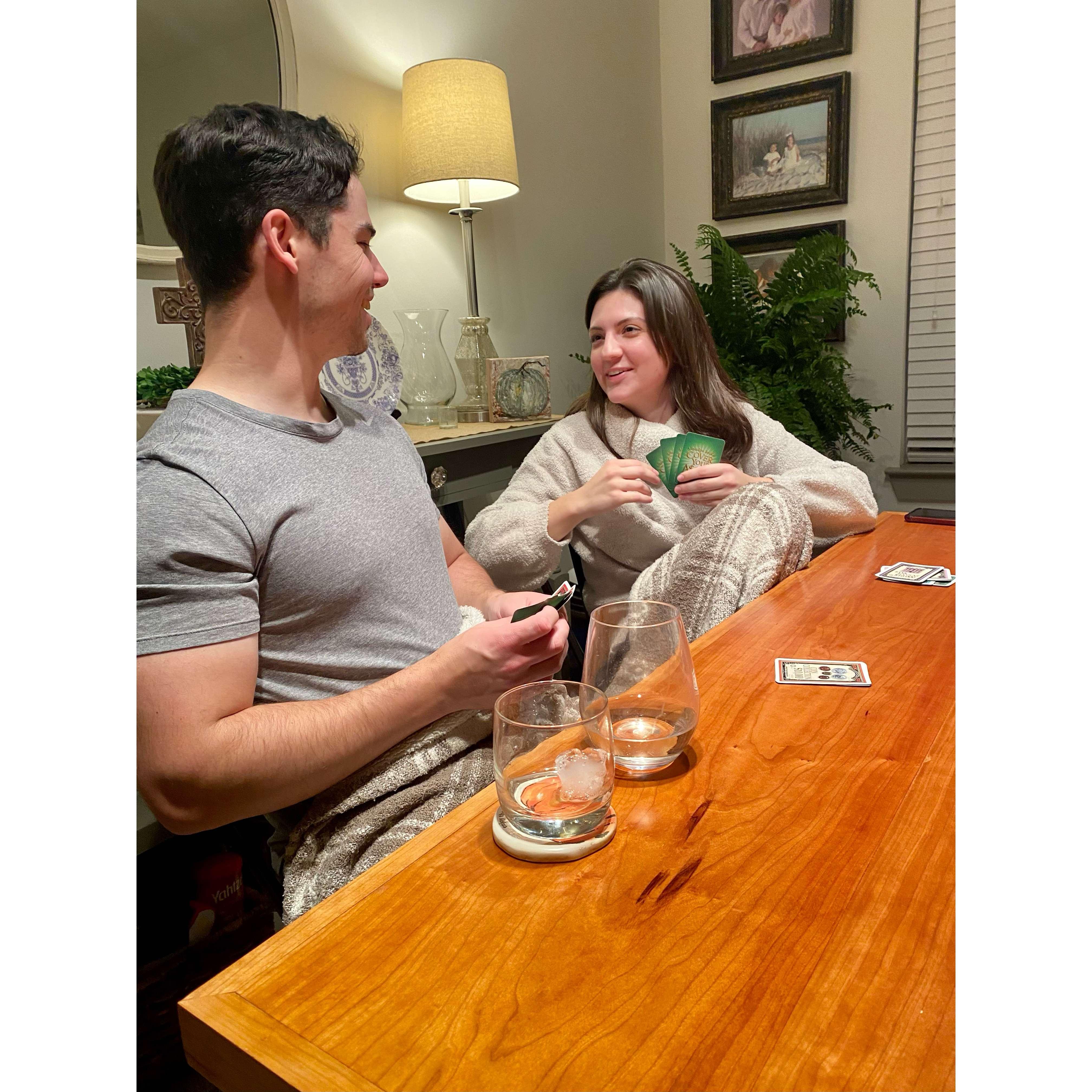 Candid photo playing Cover Your Assets, a Fain favorite.