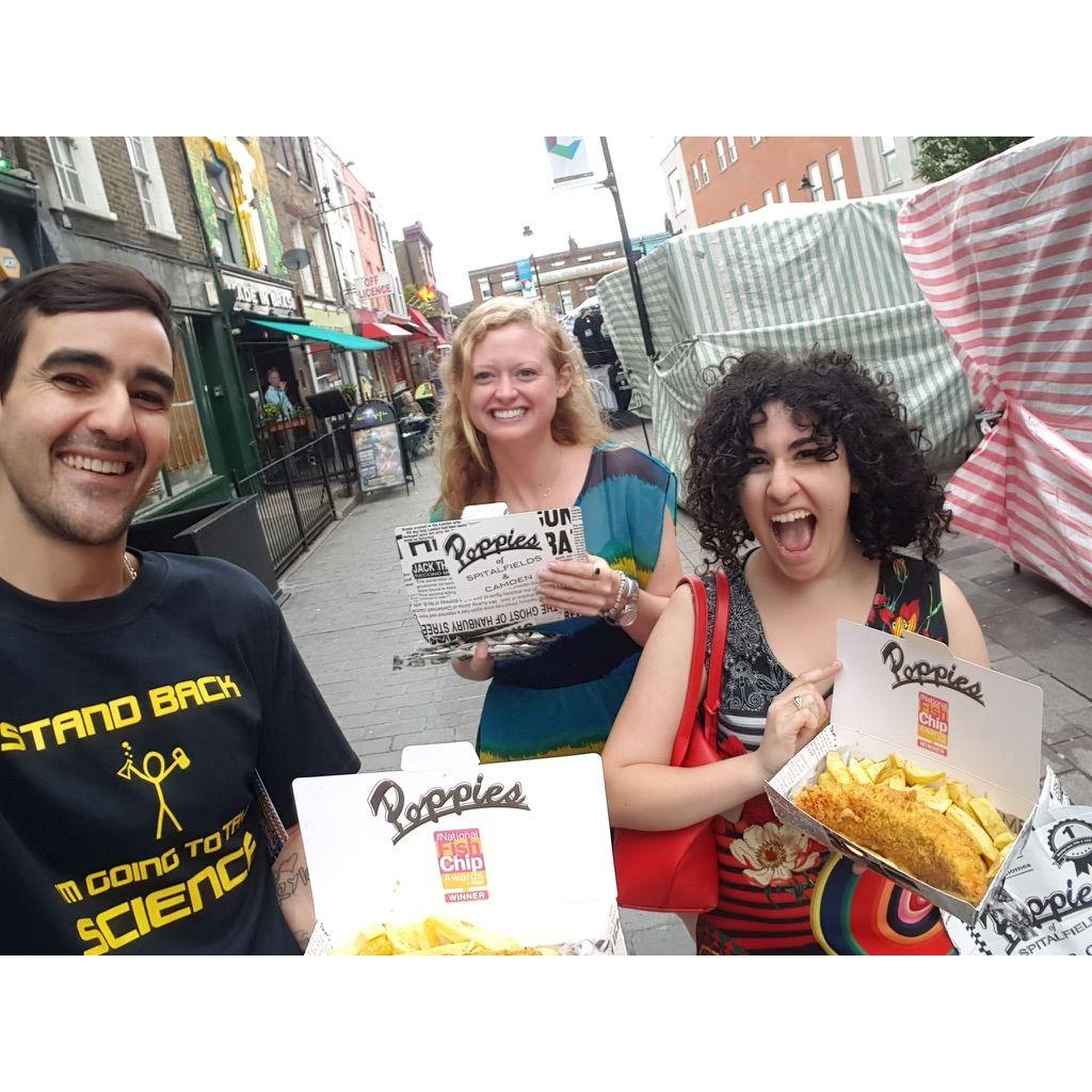 Khaled, Lexxi, and Sara in London eating the best fish and chips.