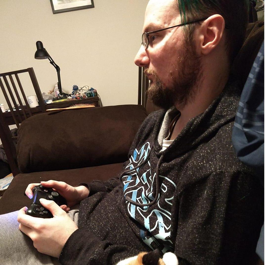 The nerd. Playing games.