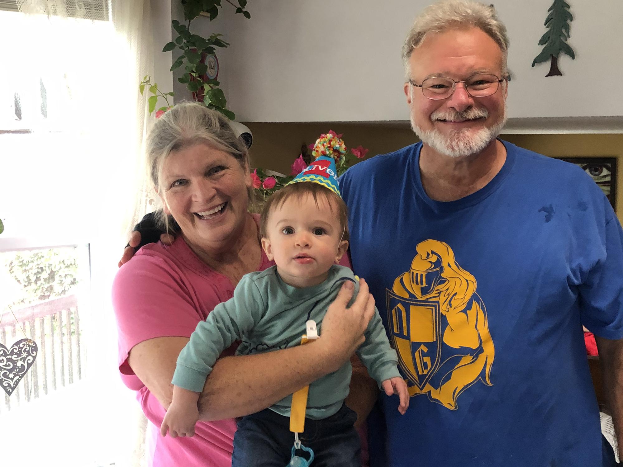 GranMo & Grandpa HoHo with Oliver on his 1st bday!