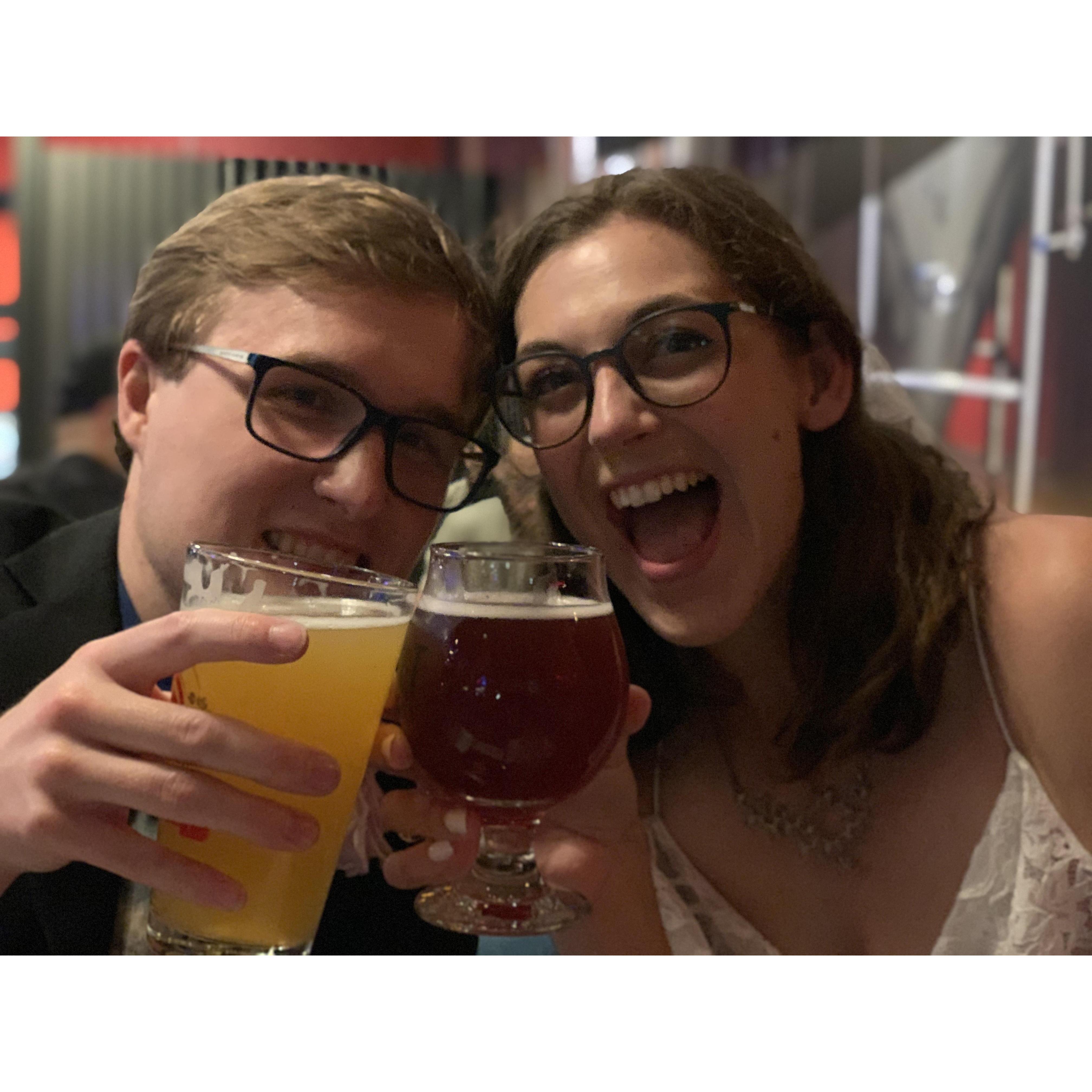 Cheersing at a bar with a patio