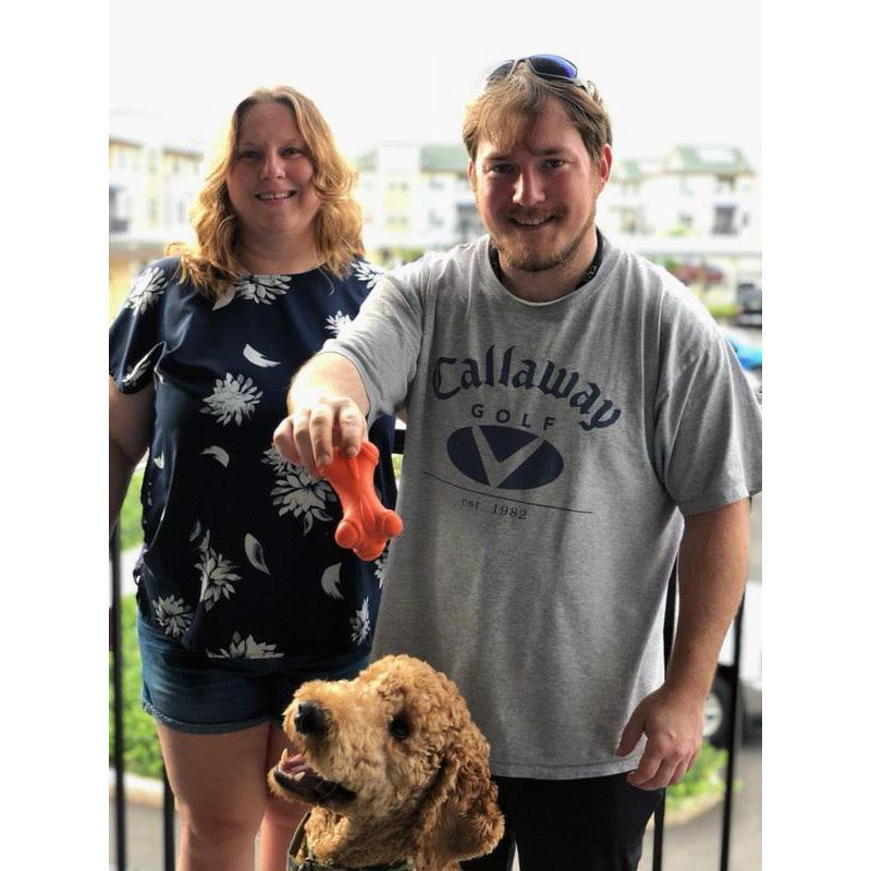 On our apartment balcony in Kapolei with Aussie.