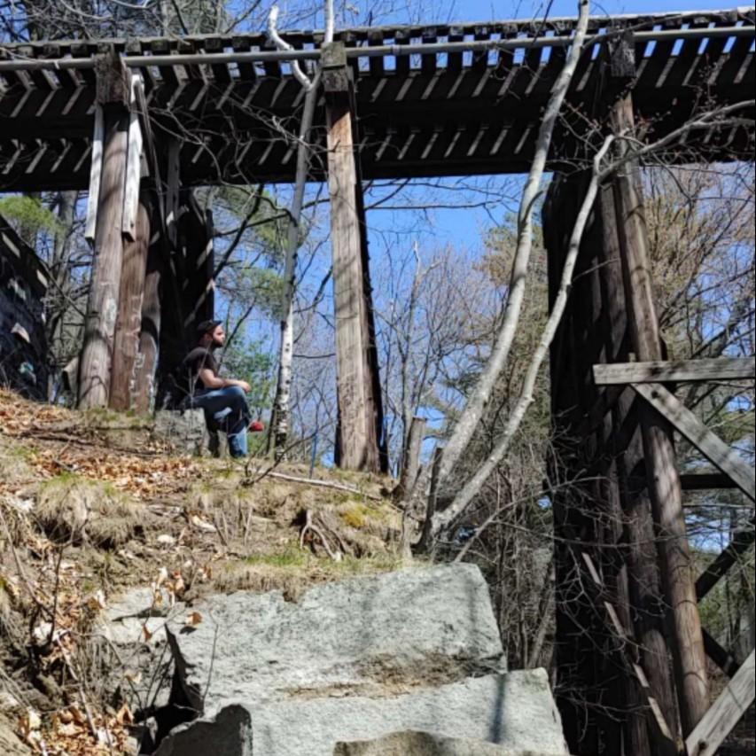 April 10, 2021 - Joe finds his peace under a wooden train trestle.