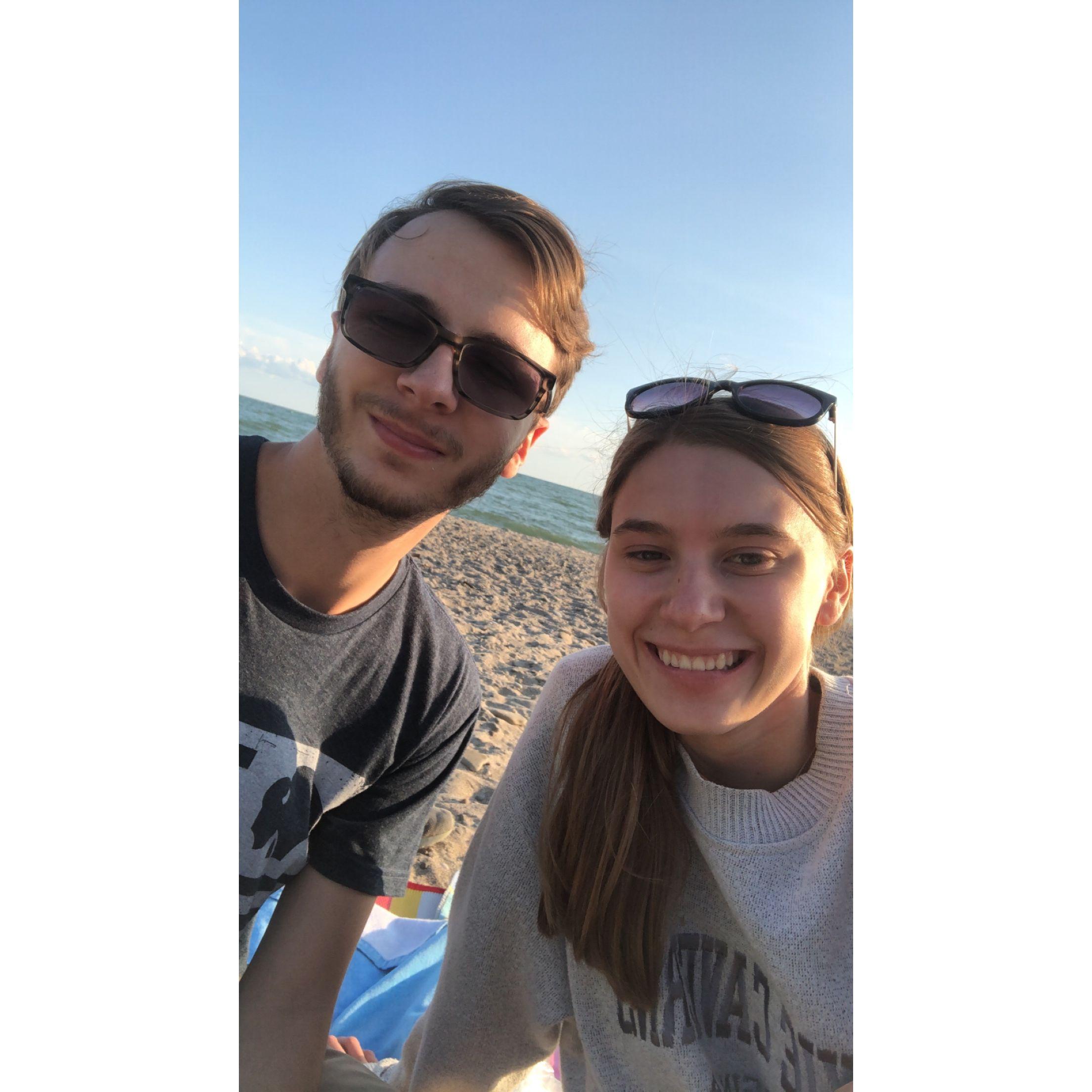Celebrating our 2nd anniversary with a picnic on the beach at Geneva-on-the-lake