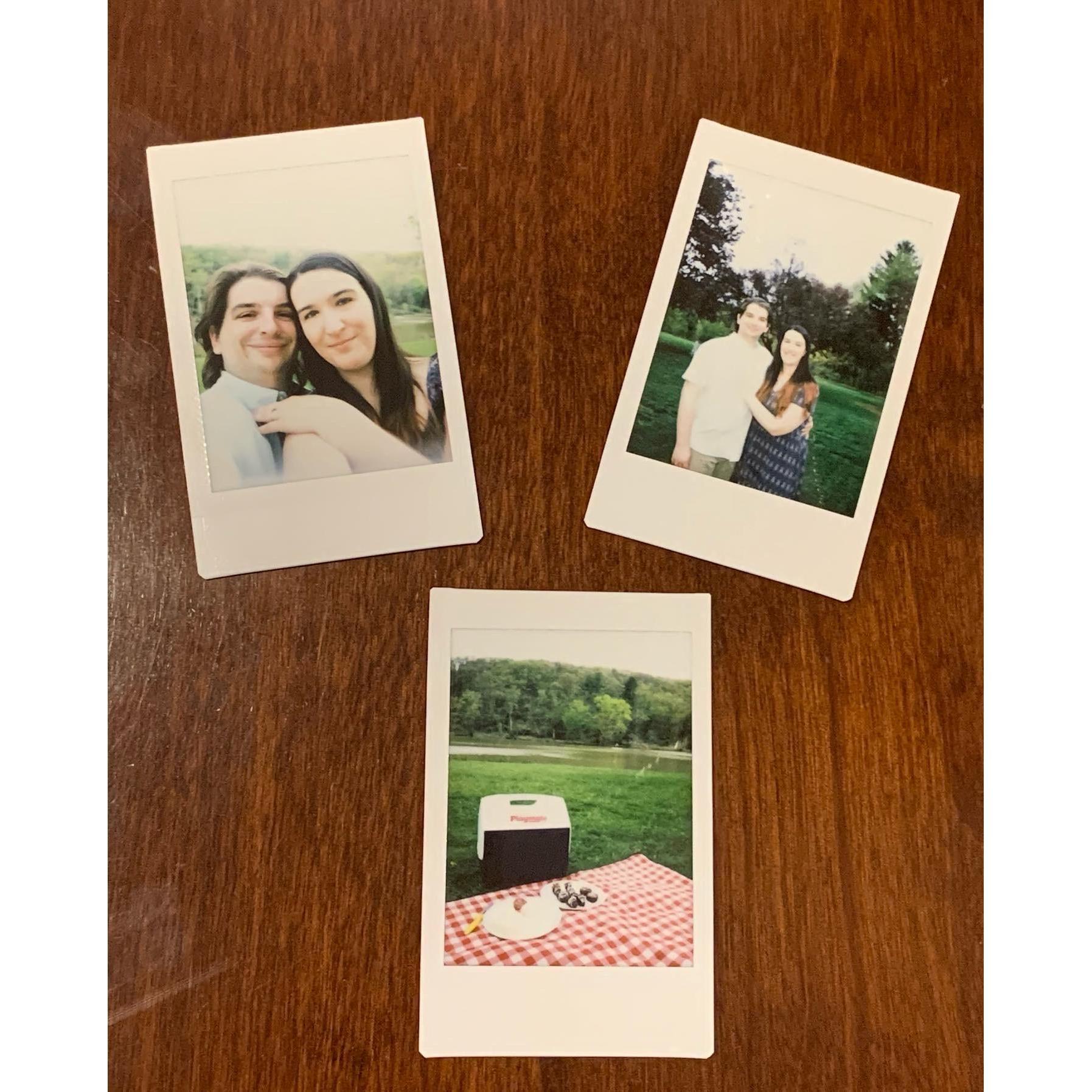 The now-infamous polariods from engagement day