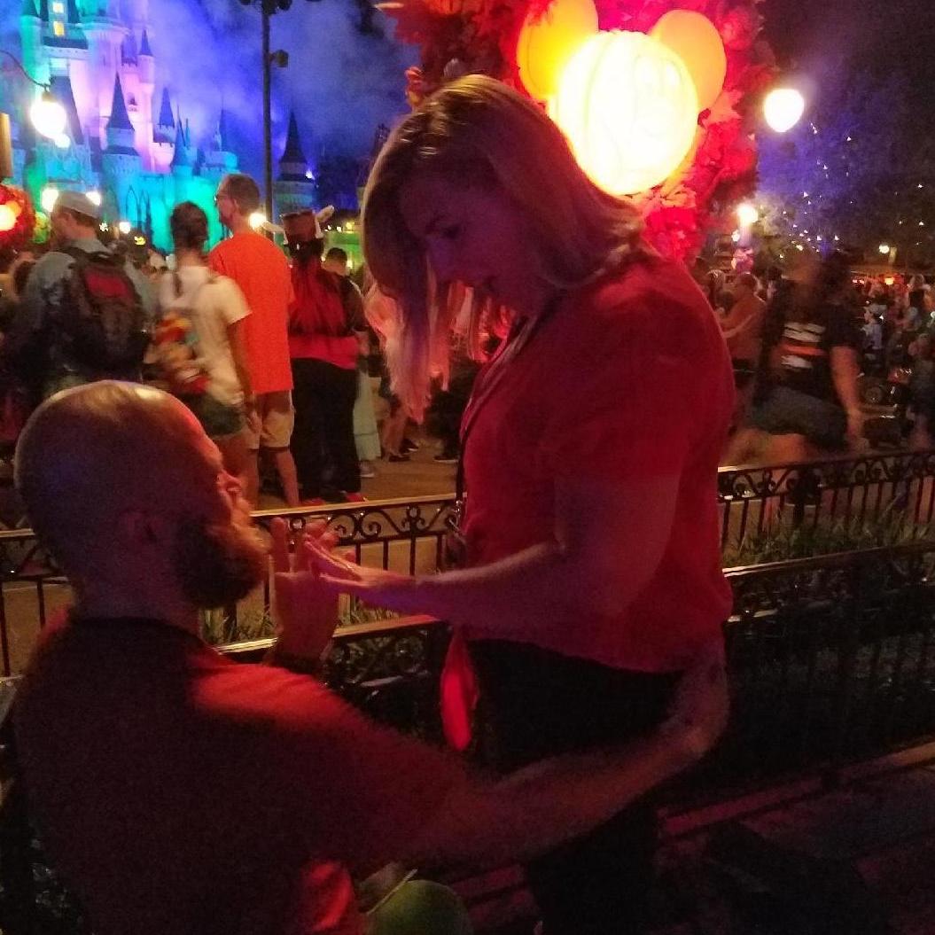Candid a stranger took when Eric proposed!