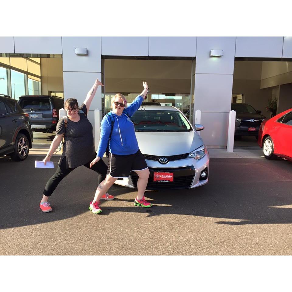 This was taken right after we got the keys to the first car we bought together!