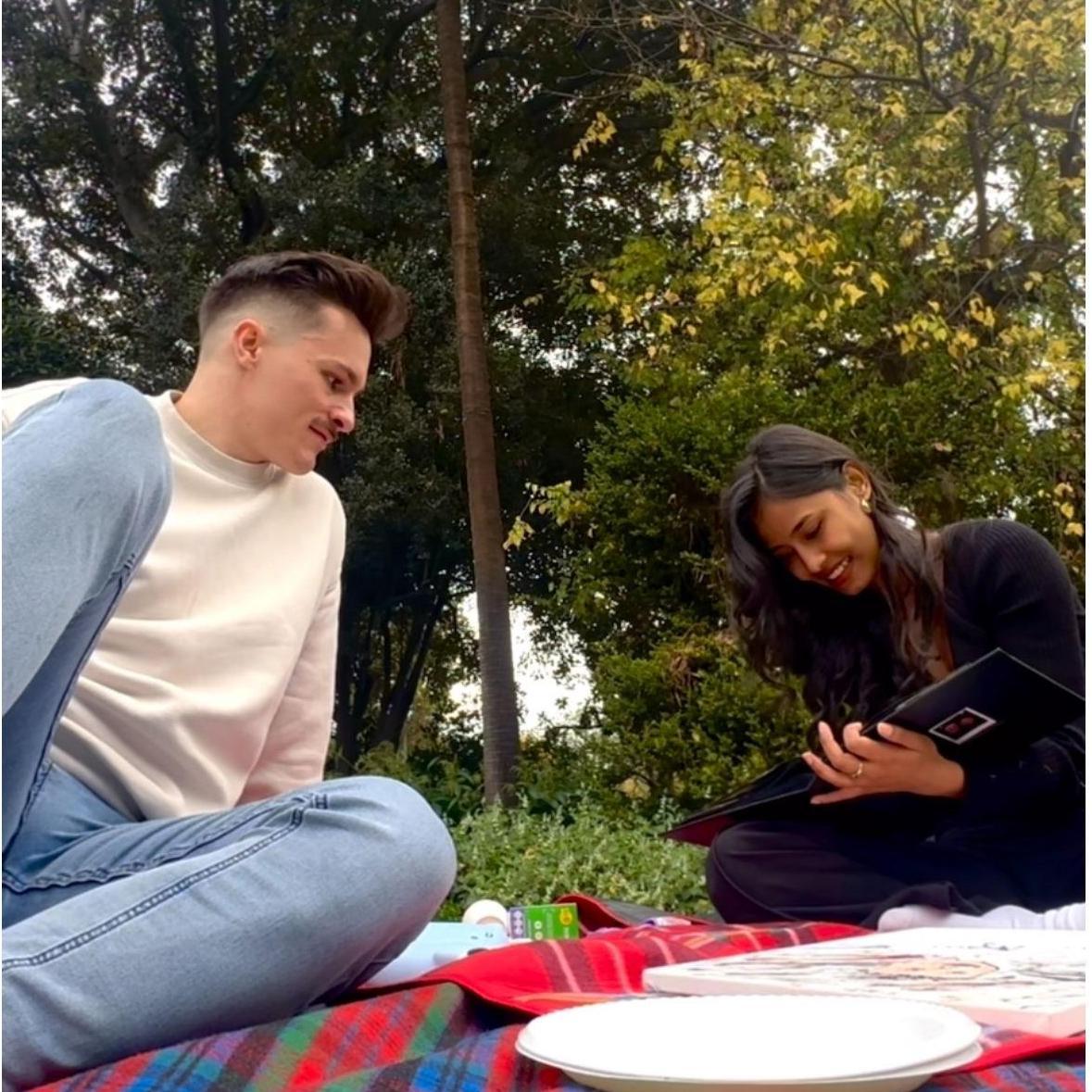 Flipping through memories, and on the last page, a beautiful surprise—‘Will you marry me?’ 💍