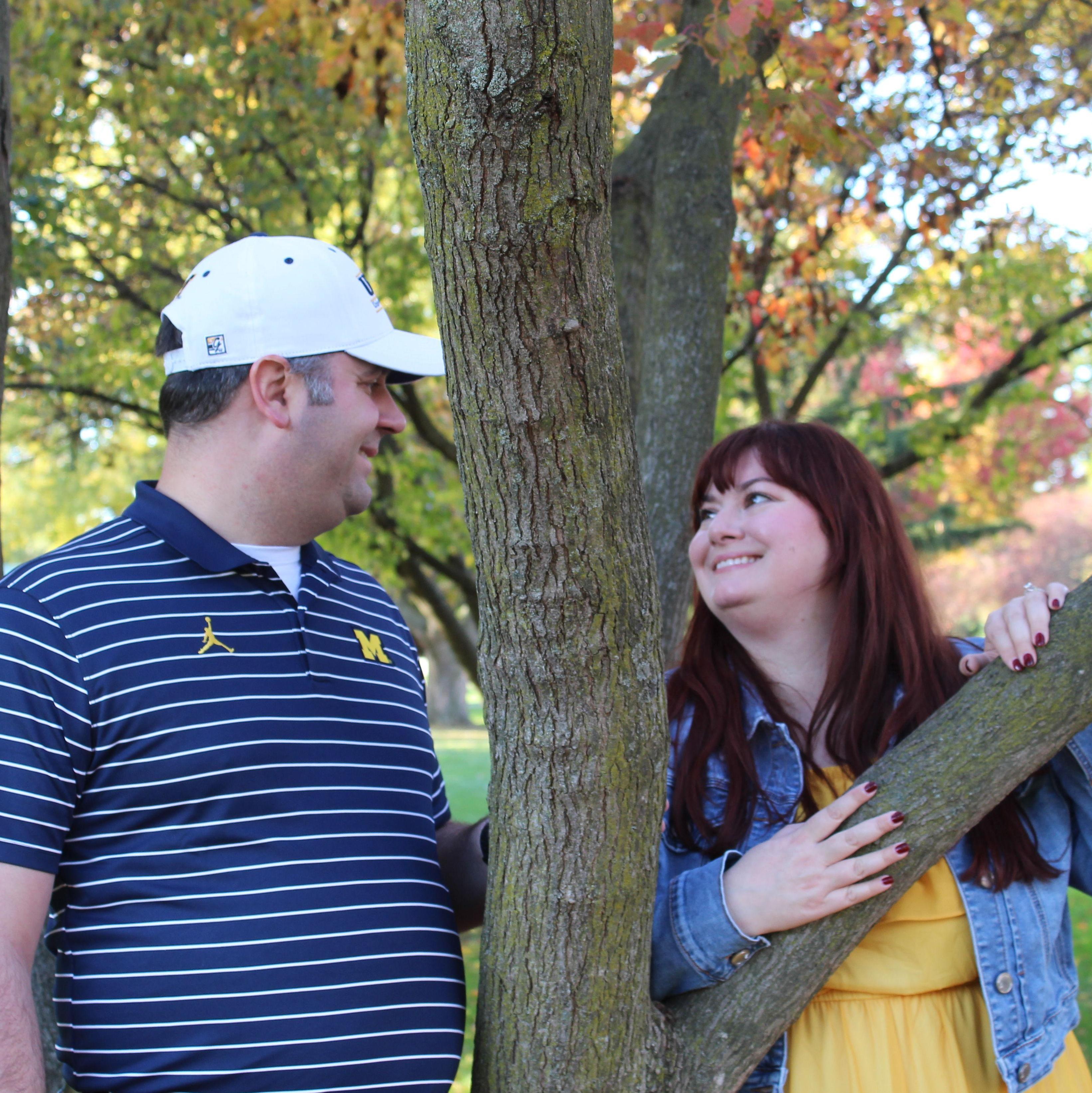 We knew that for our engagement shoot we needed to combine our love of U of M Football and the changing leaves of autumn.