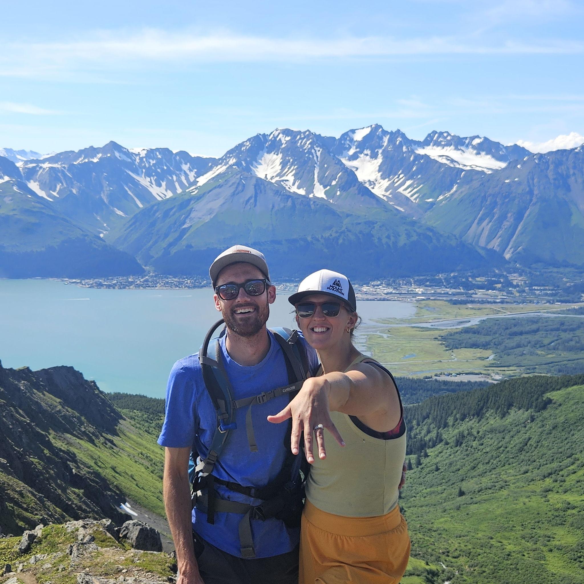 Aaron proposed on such a sunny, beautiful day! With a gun on his chest, how could she say no??