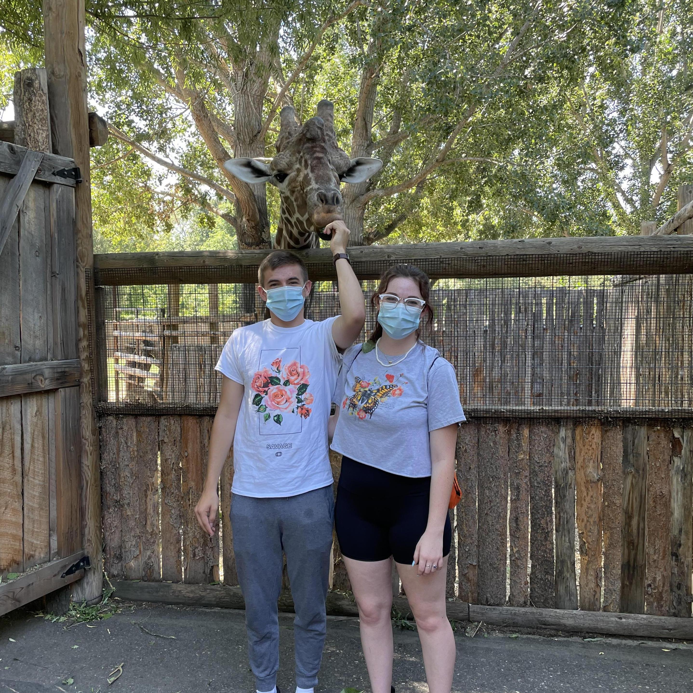 Us feeding a Giraffe. It was so much fun.