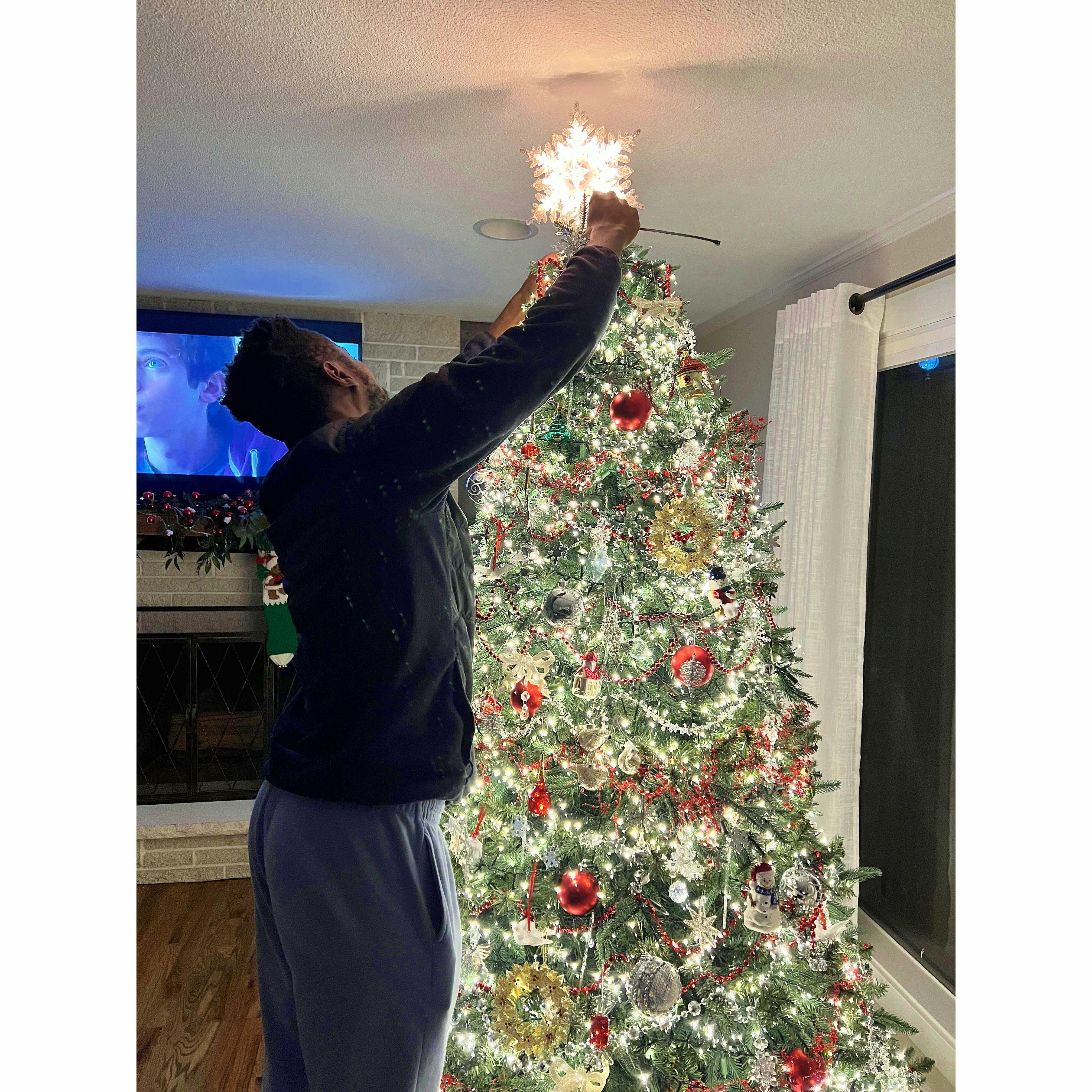 Kev helped Abby's Mom with her Christmas Tree before he left to DC. It's nice to have more tall men in the family.