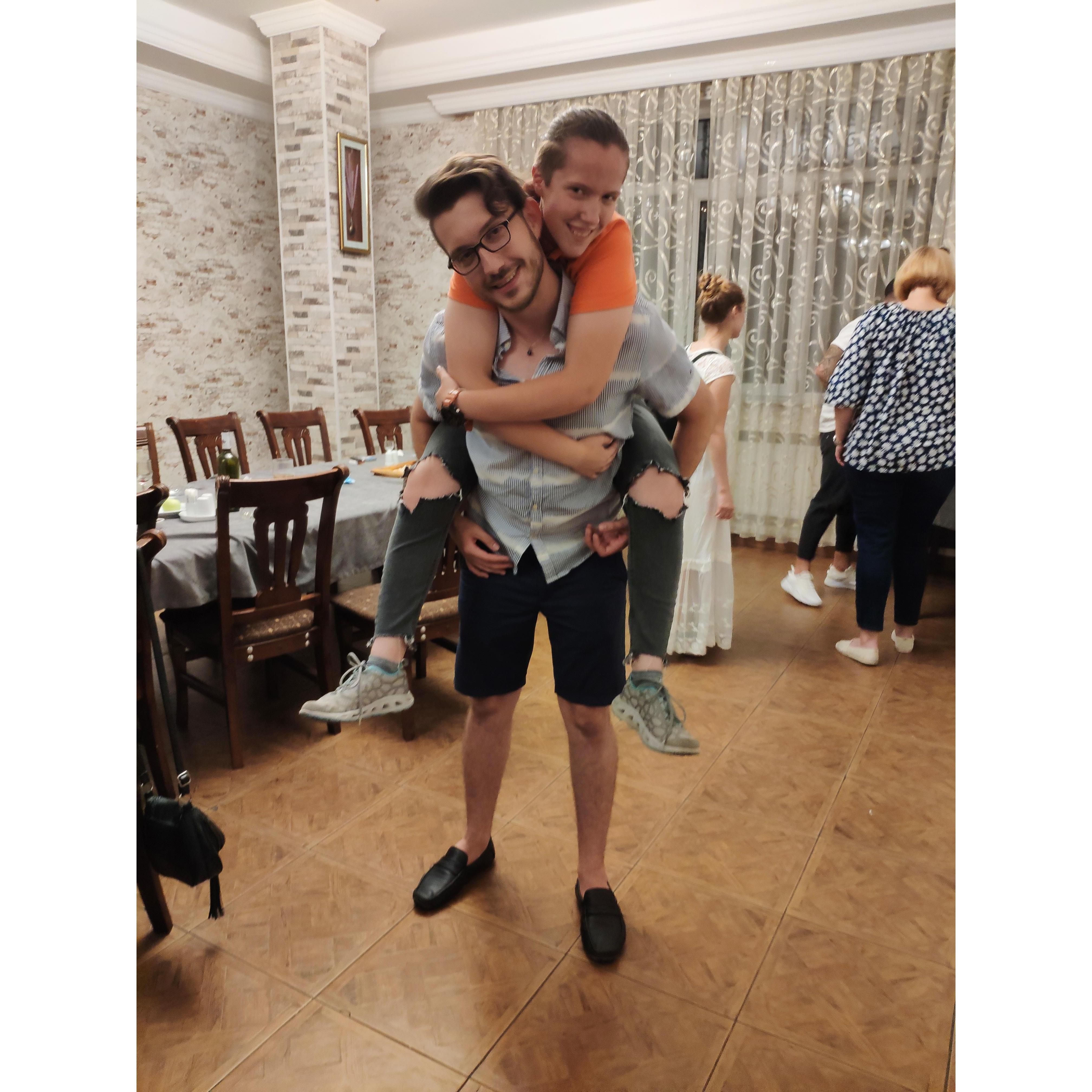 Oleg being the big brother that he is to Polina, his baby sister.