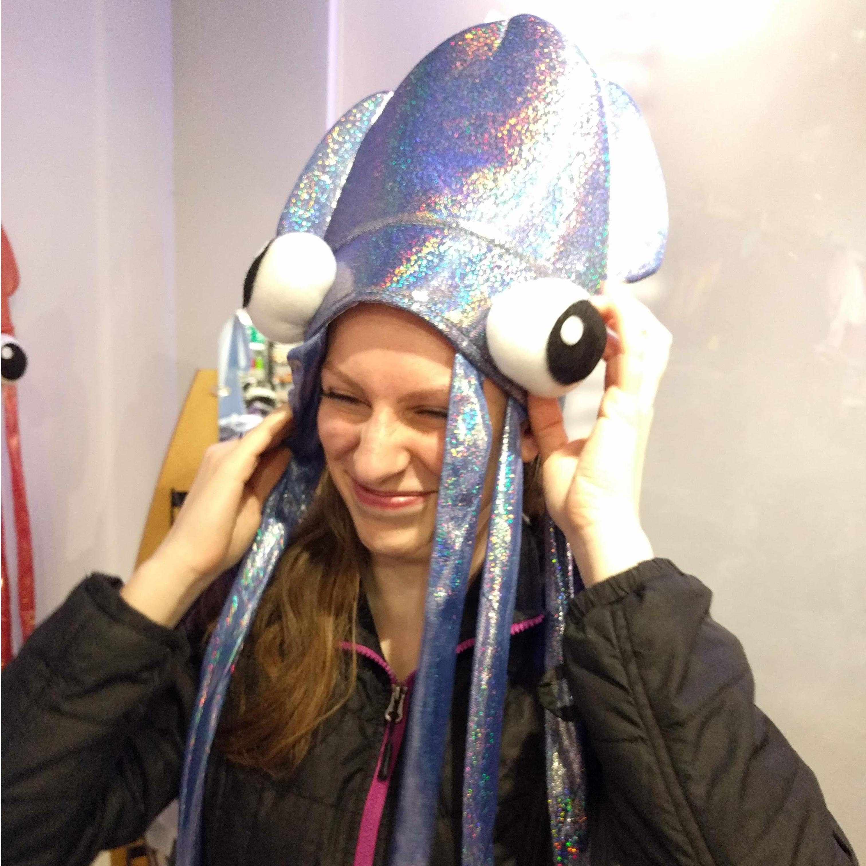 We went to the Tennessee Aquarium and found a squid hat! This one is Yong's favorite picture from that trip. Libbi is all "squin"ty ;) (02/16/2019, Chattanooga, TN)