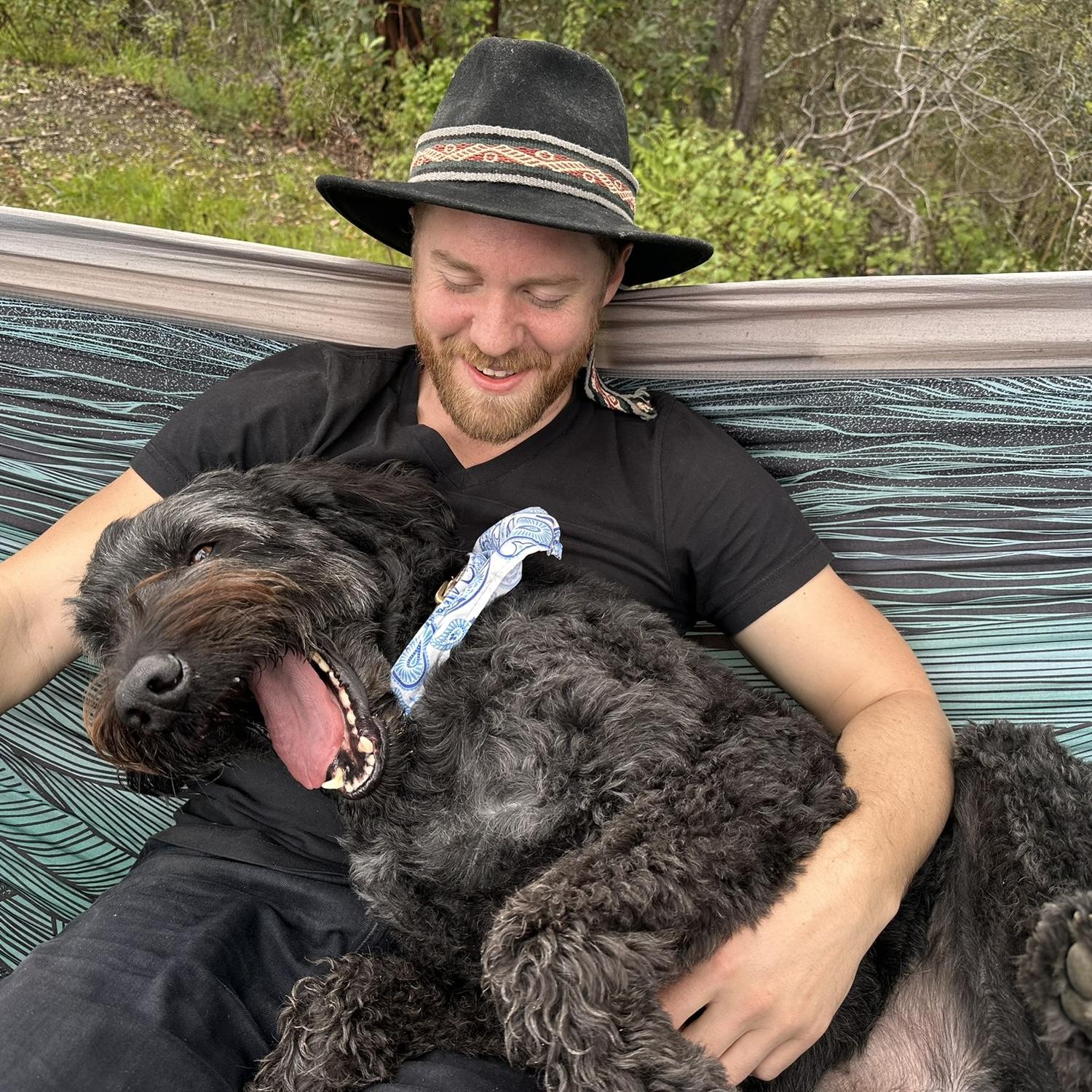 We set up an outdoor area at the trailer with a hammock and fire pit. Percy had no trouble getting comfortable. March 2025