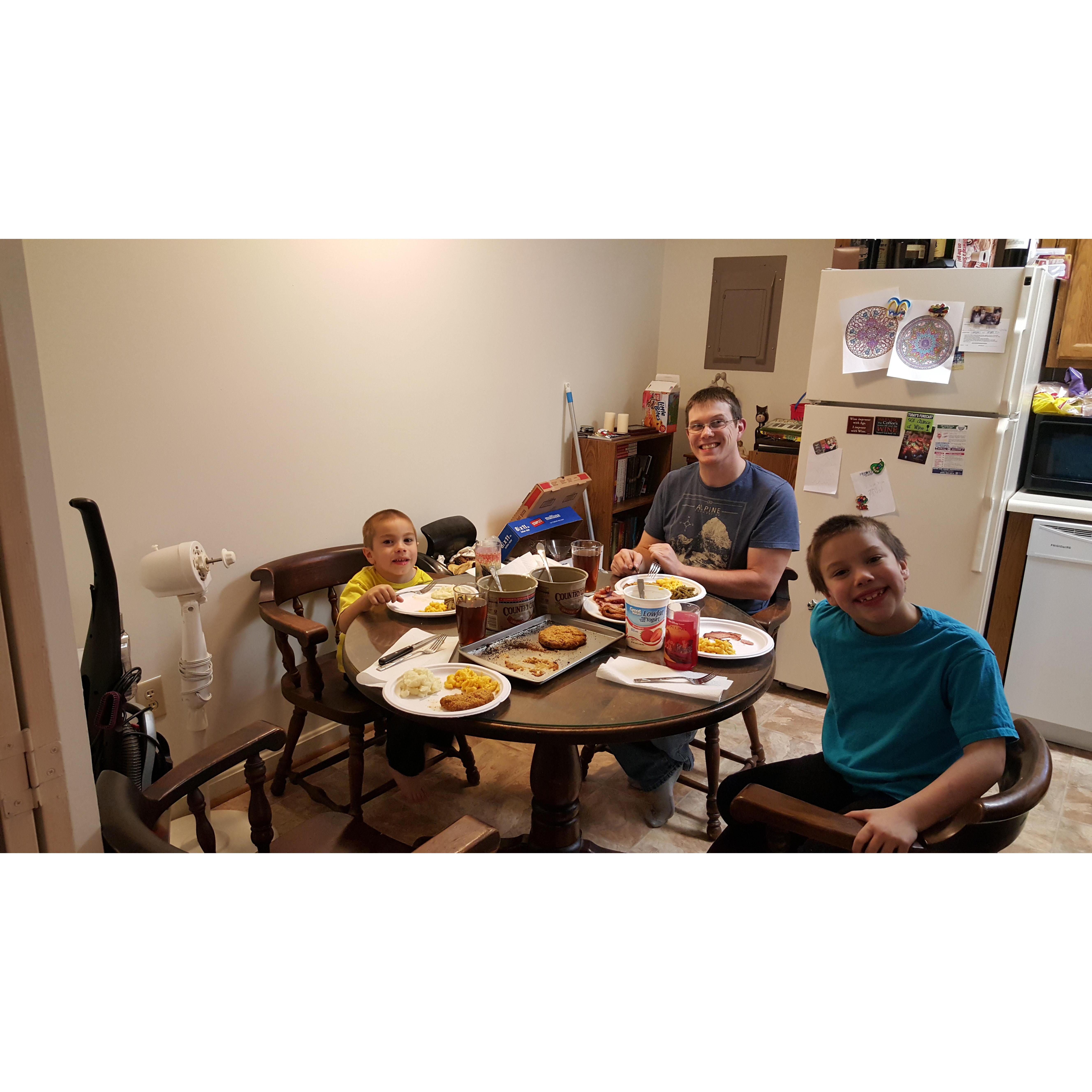 Dinner in our first "home" together with our boys.