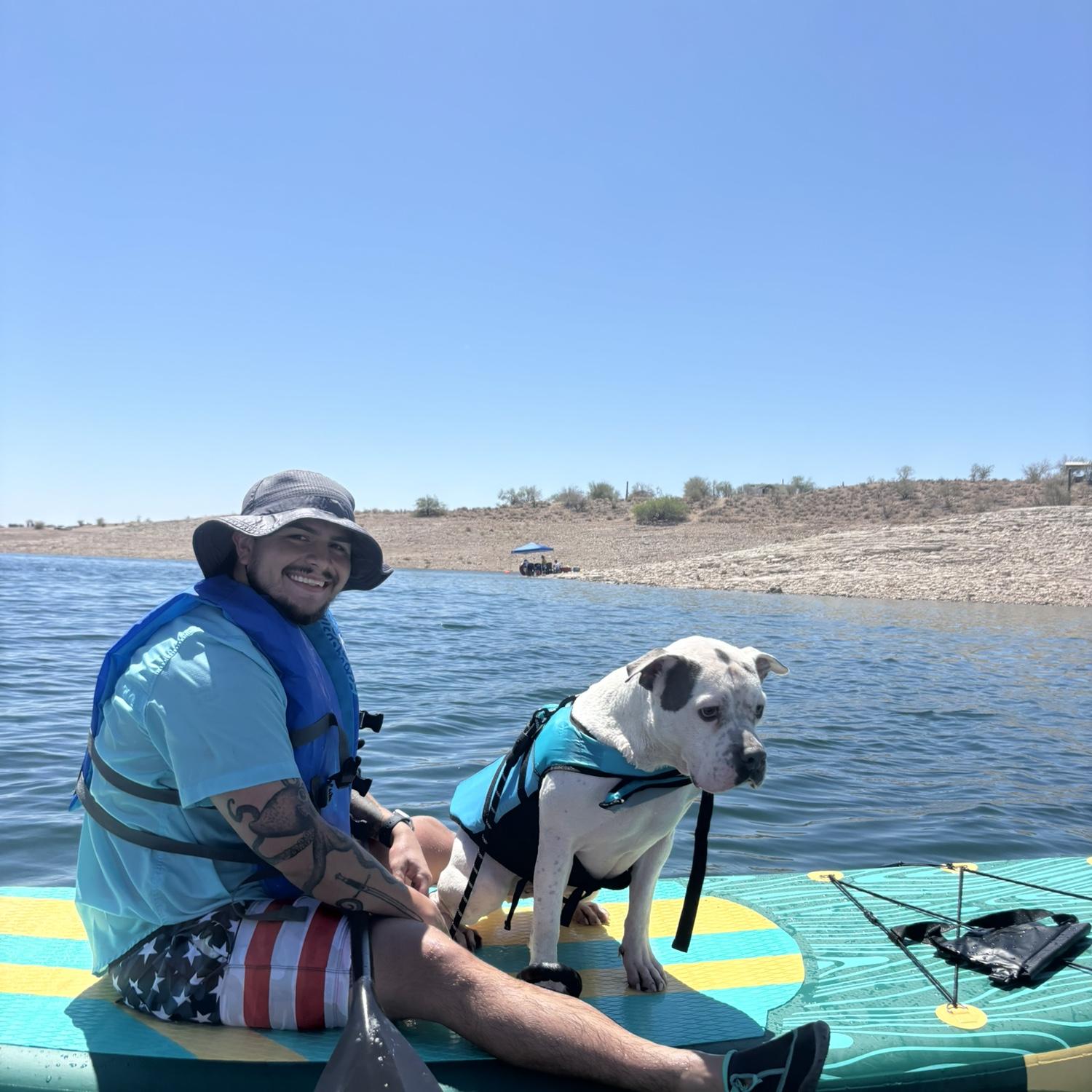 Rocky’s first time paddle boarding 🐕