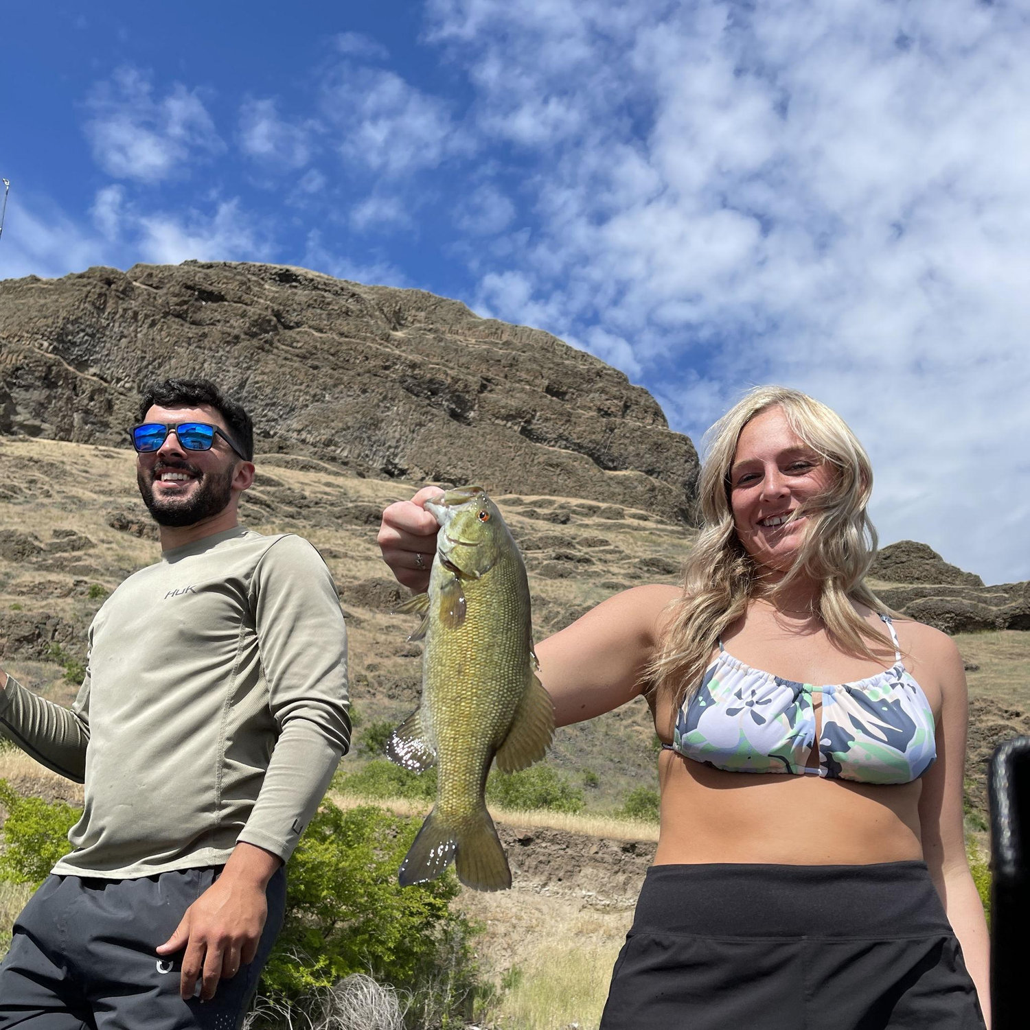 First time fishing together! Christopher caught the fish but let Morgan reel it in, teamwork!!