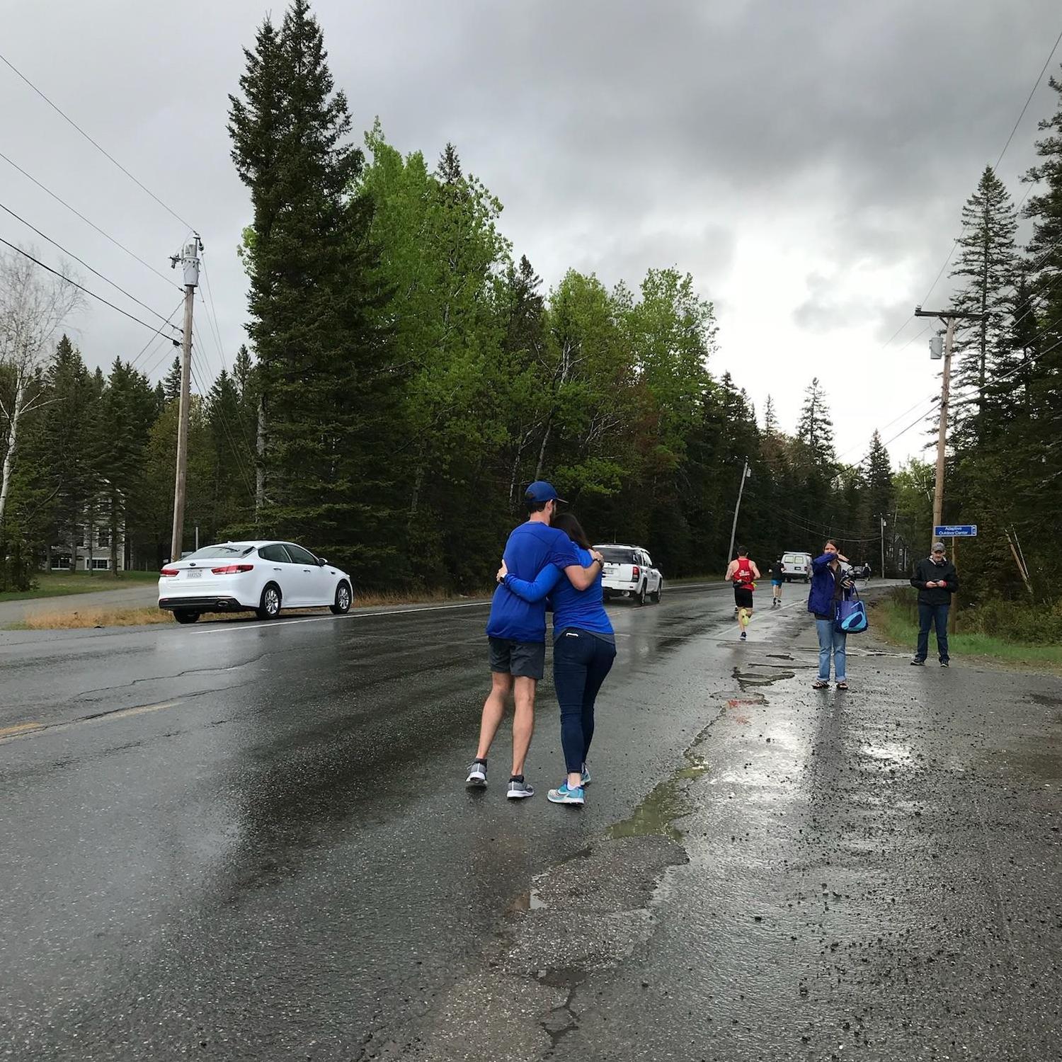 A quick hug along the route of the Sugarloaf Marathon that Jonathan ran in May 2018 - Sugarloaf, Maine