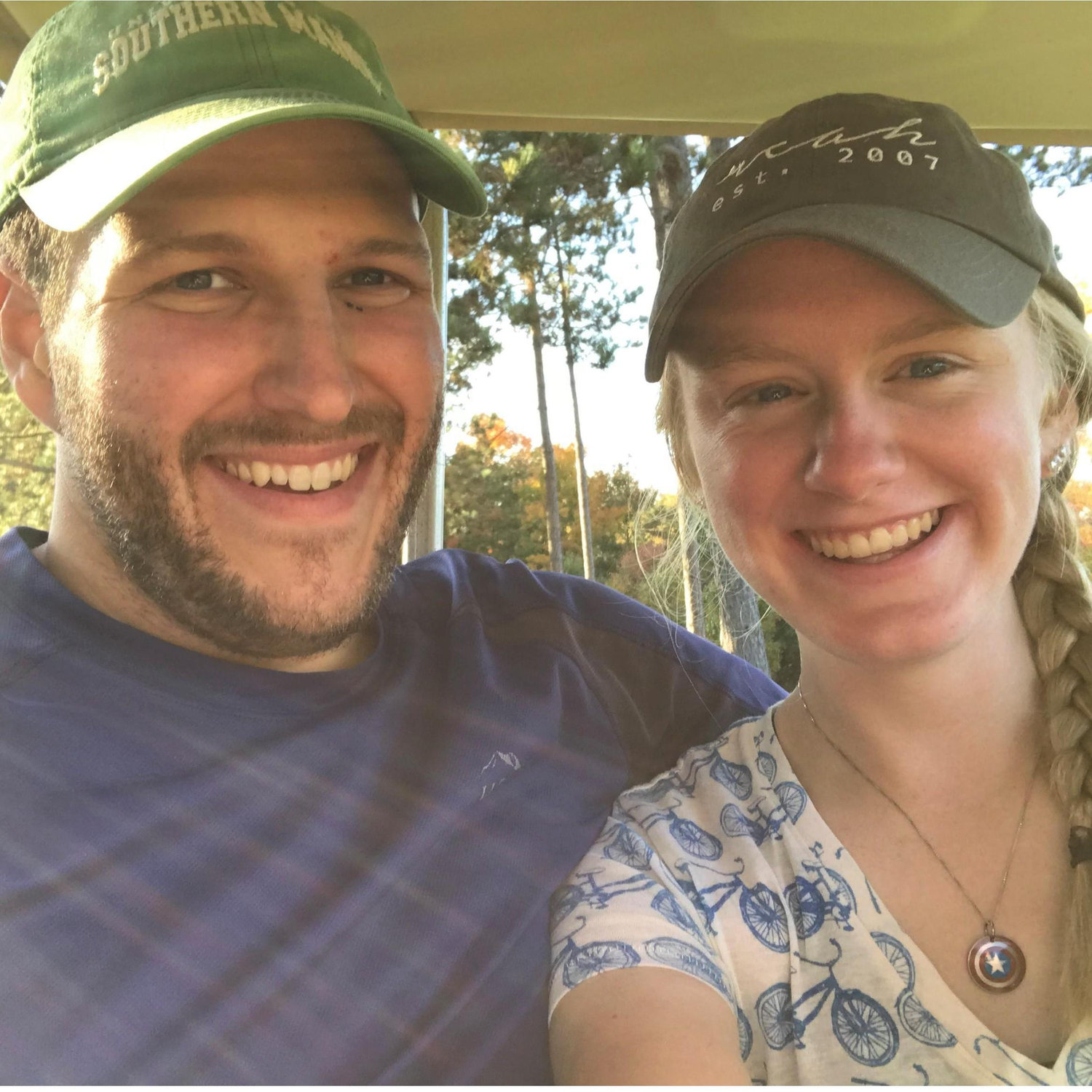 From one of the 2 times we've golfed together with friends. Not a common pastime for us but a cute shot.