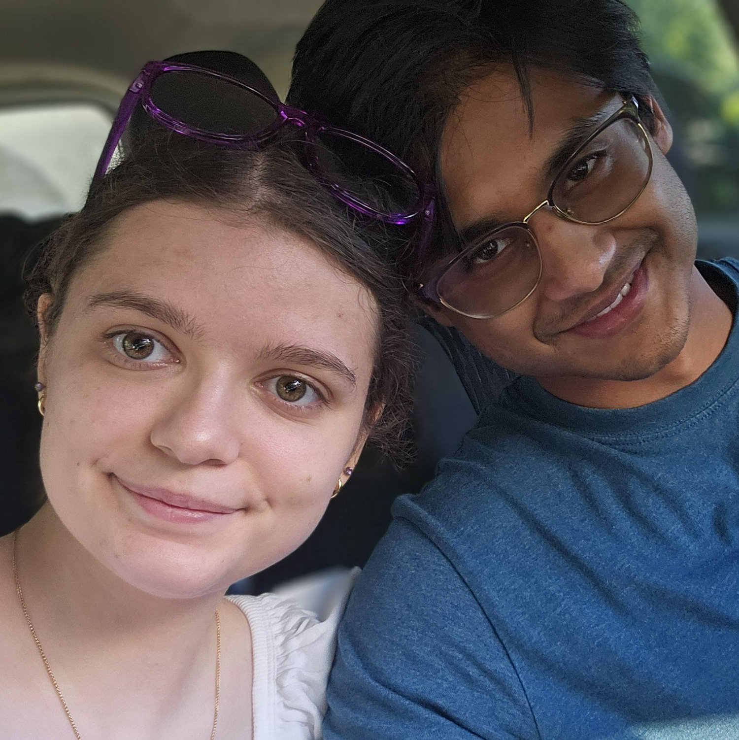 Julia and Shabit in Shabit's car together.