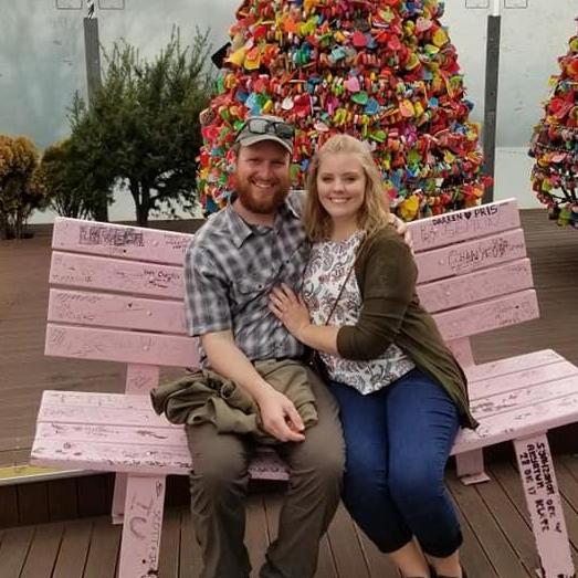 Sitting on the "love bench" in South Korea after Joe proposed!