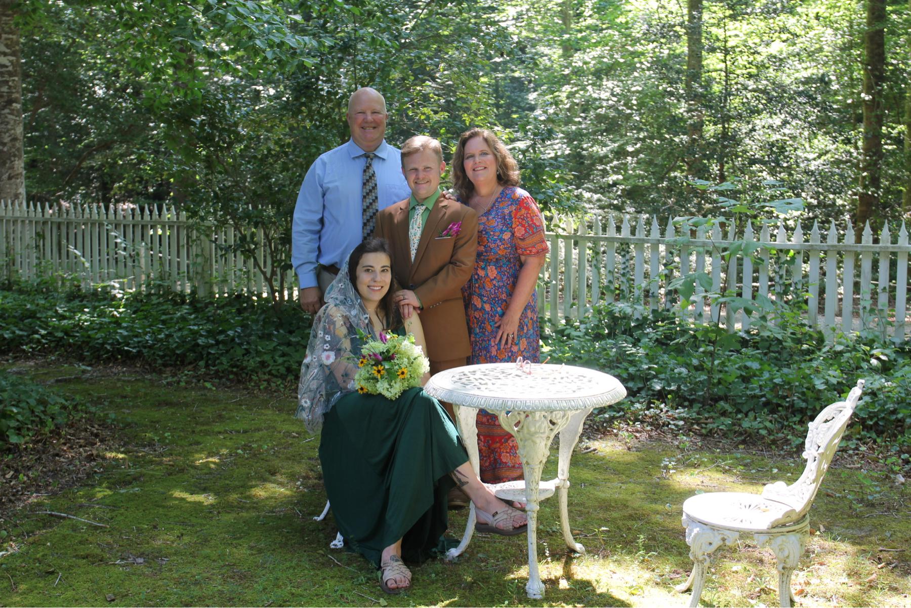 Eliot and Natalie with Eliot’s parents, Willie and Mary Jo, on the wedding day!