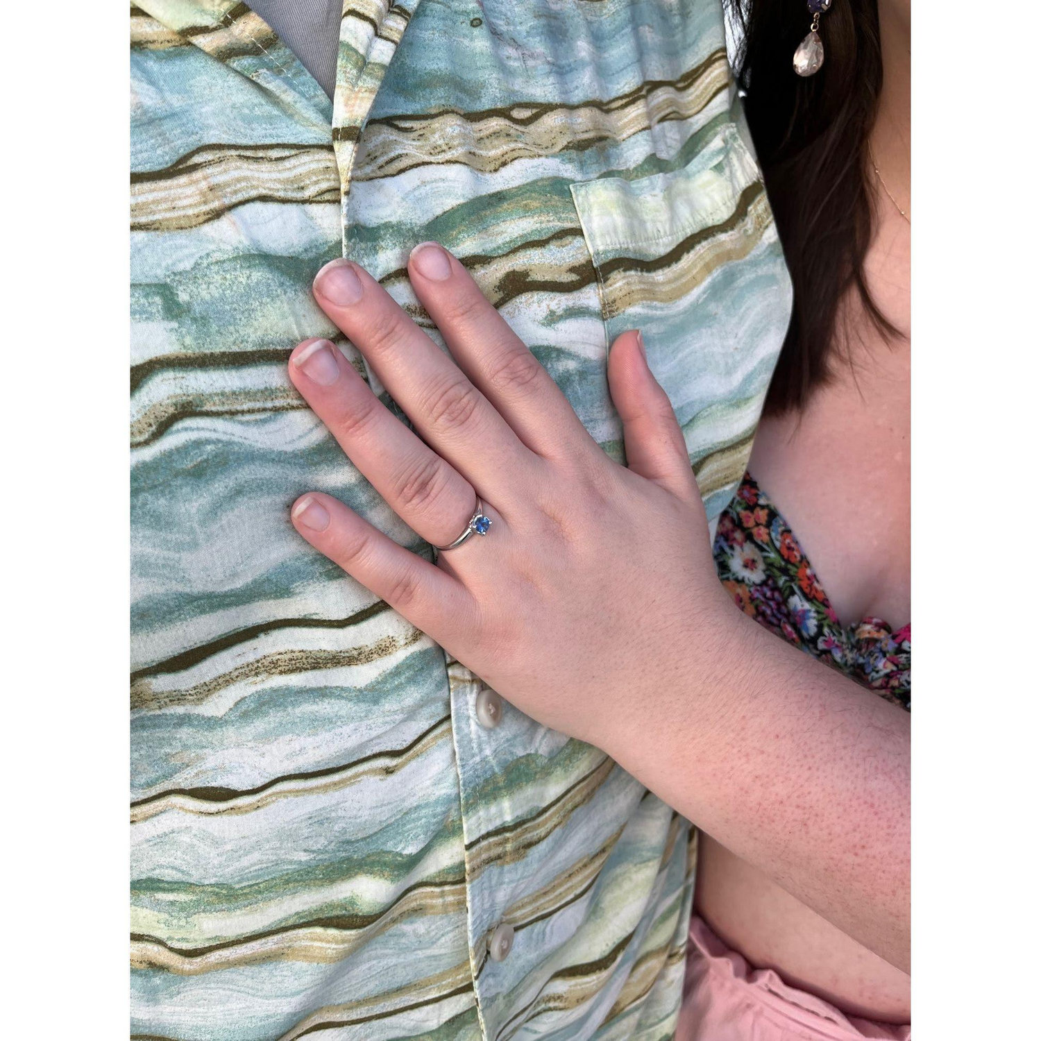 Adam received Abbie's Grandmother, Joanne's, ring. Refinished and set with her own stone, Abbie wears her late Grandma's ring with pride.