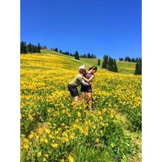 Trying to run away in a field of flowers, Yellowstone National Park 2017