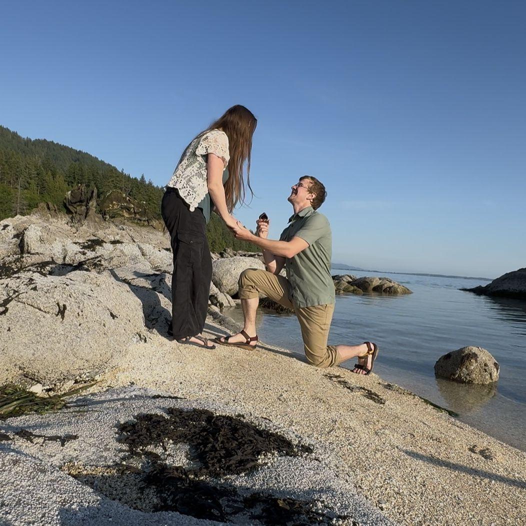 Tor proposed at Larrabee State Park in June 2025! ❤️ He rowed Charlotte out in a rowboat he built himself to pop the question at a little island only present at certain tides.