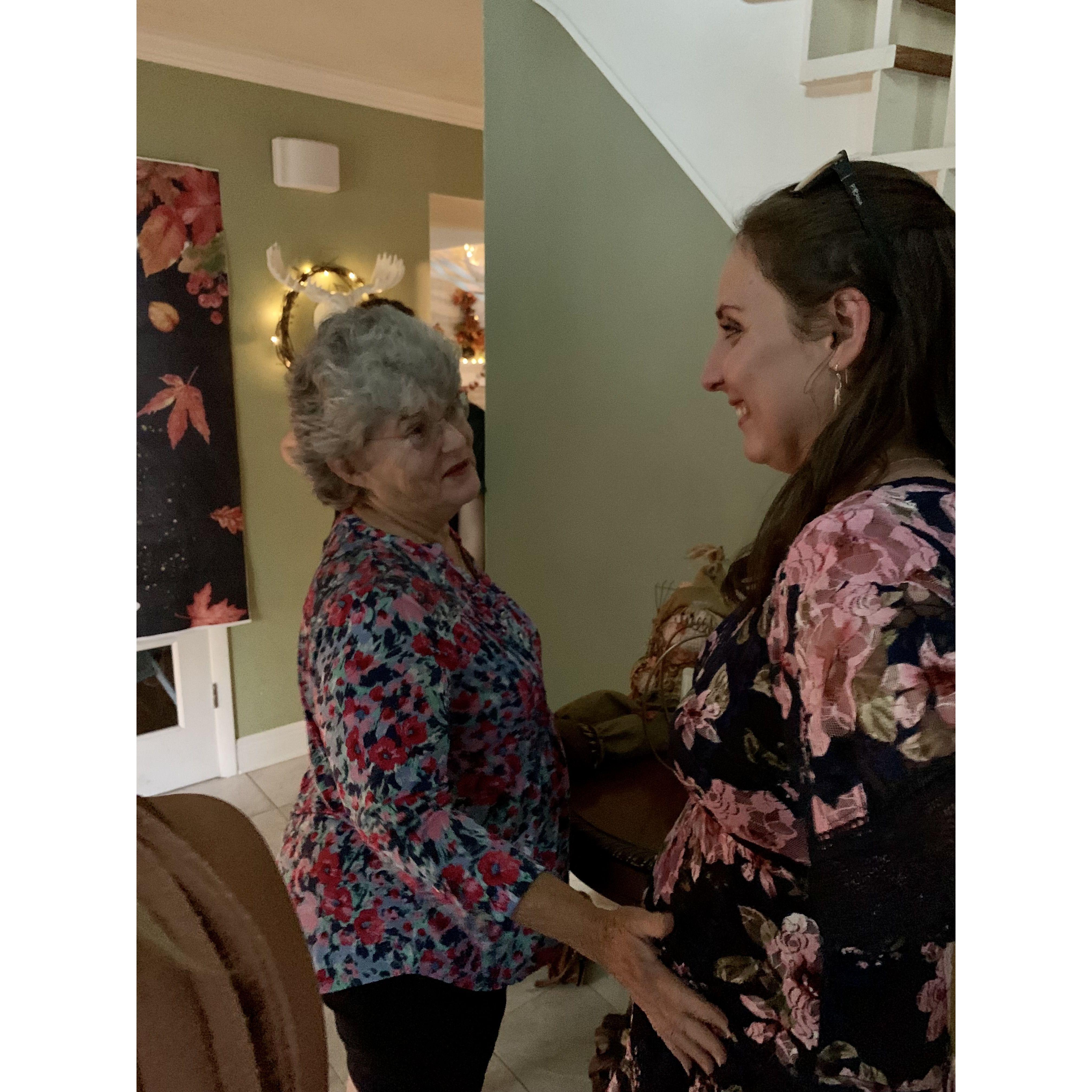 Aunt Kandi feeling the bump for a gender prediction!