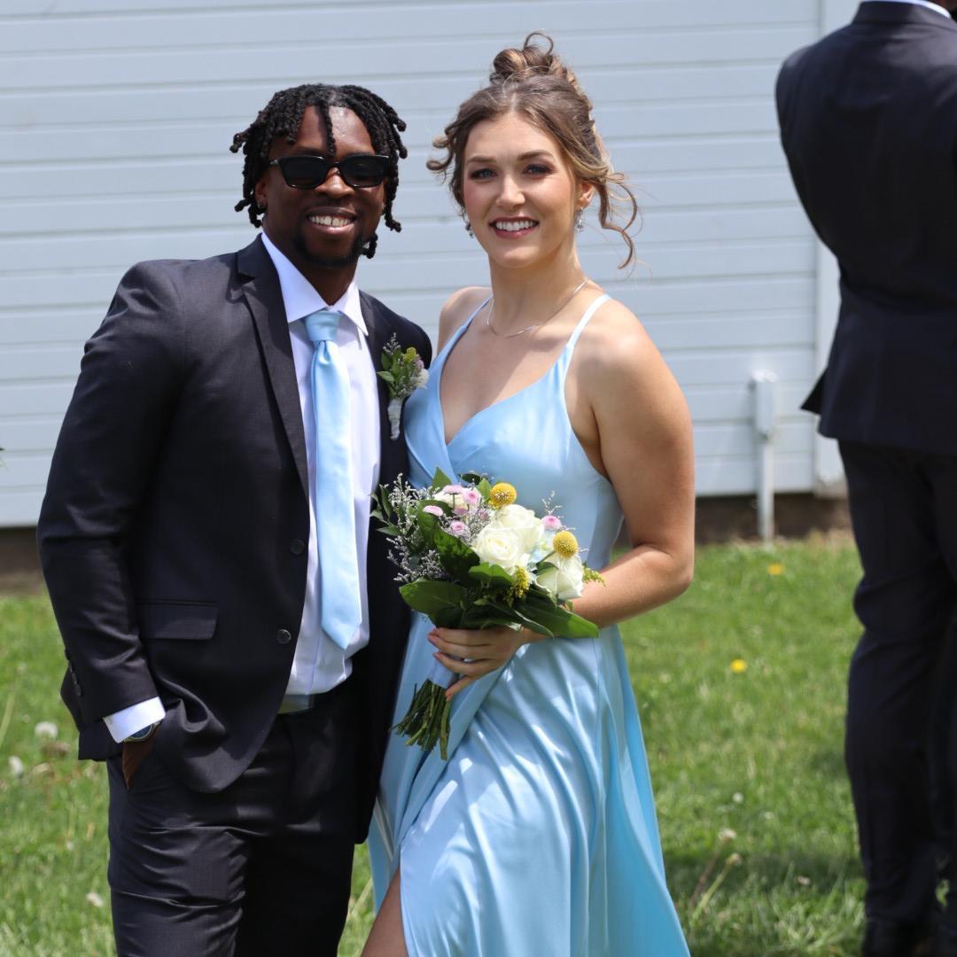 All dressed up for Grace and Ayo's wedding that we got to be in together!