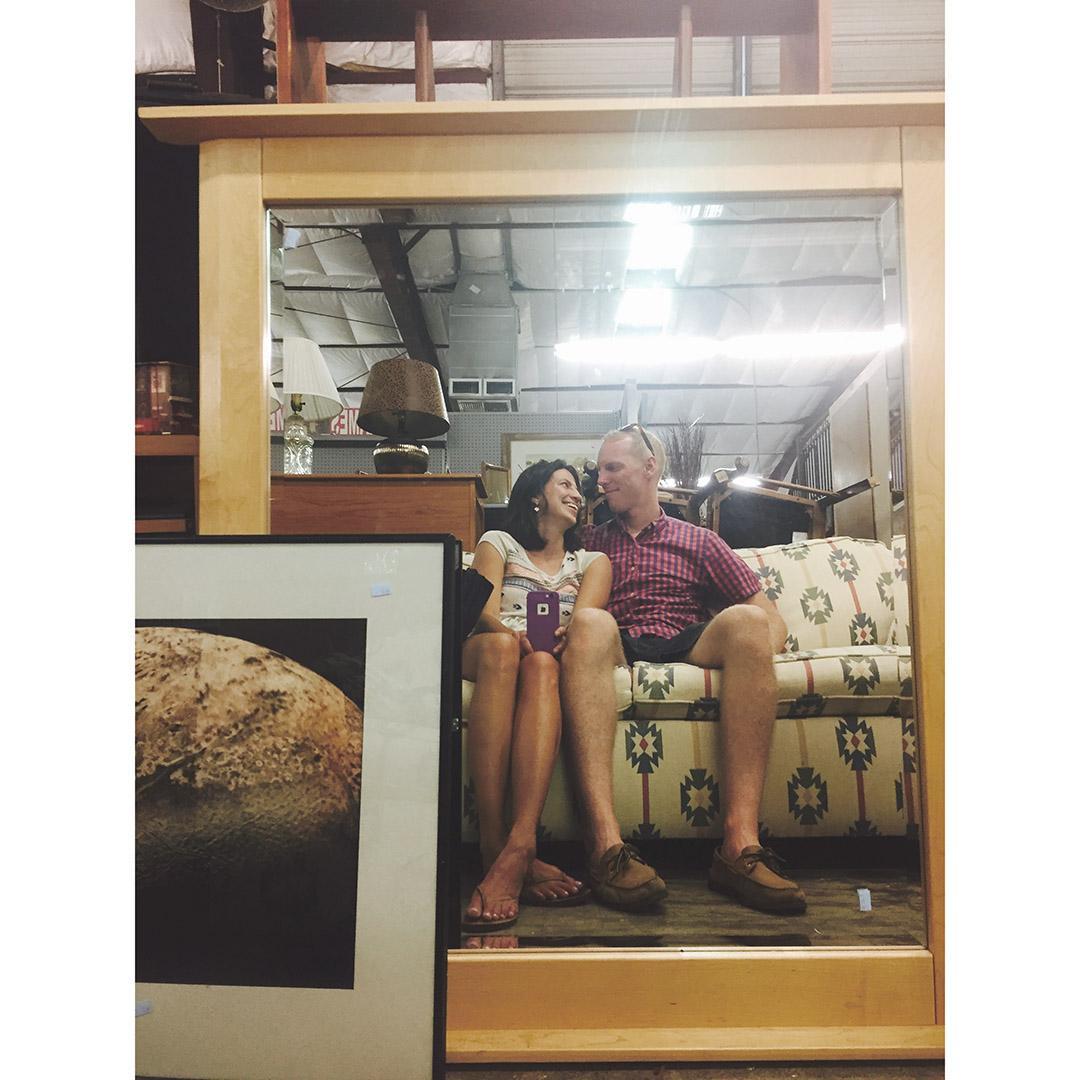 One of our dates, hanging on a couch in a thrift store to get out of the heat.