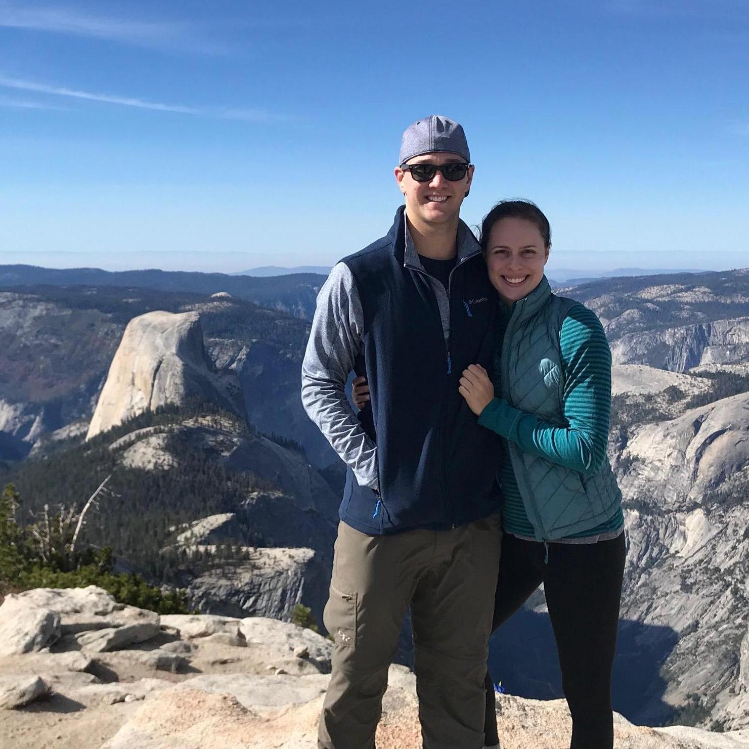 They made it up 7 miles and across the ridge to the top and WOW the views were phenomenal! Do you see Max's hand securely in his vest pocket holding onto the ring box? Hannah didn't notice...