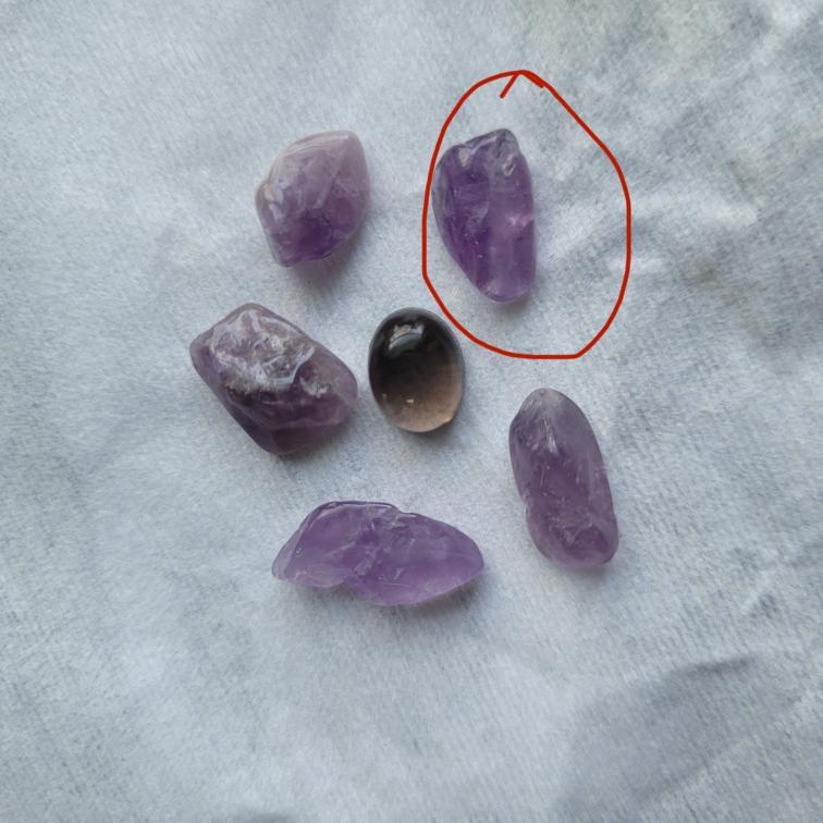 The middle and the circled stone is what we picked out!