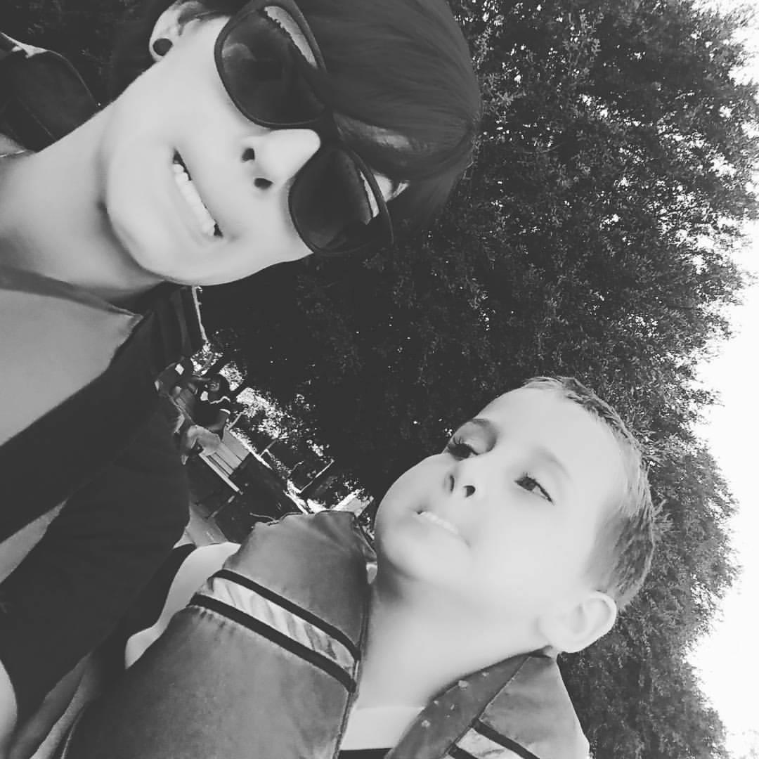 Ashleigh and Jaxson on a pedal boat