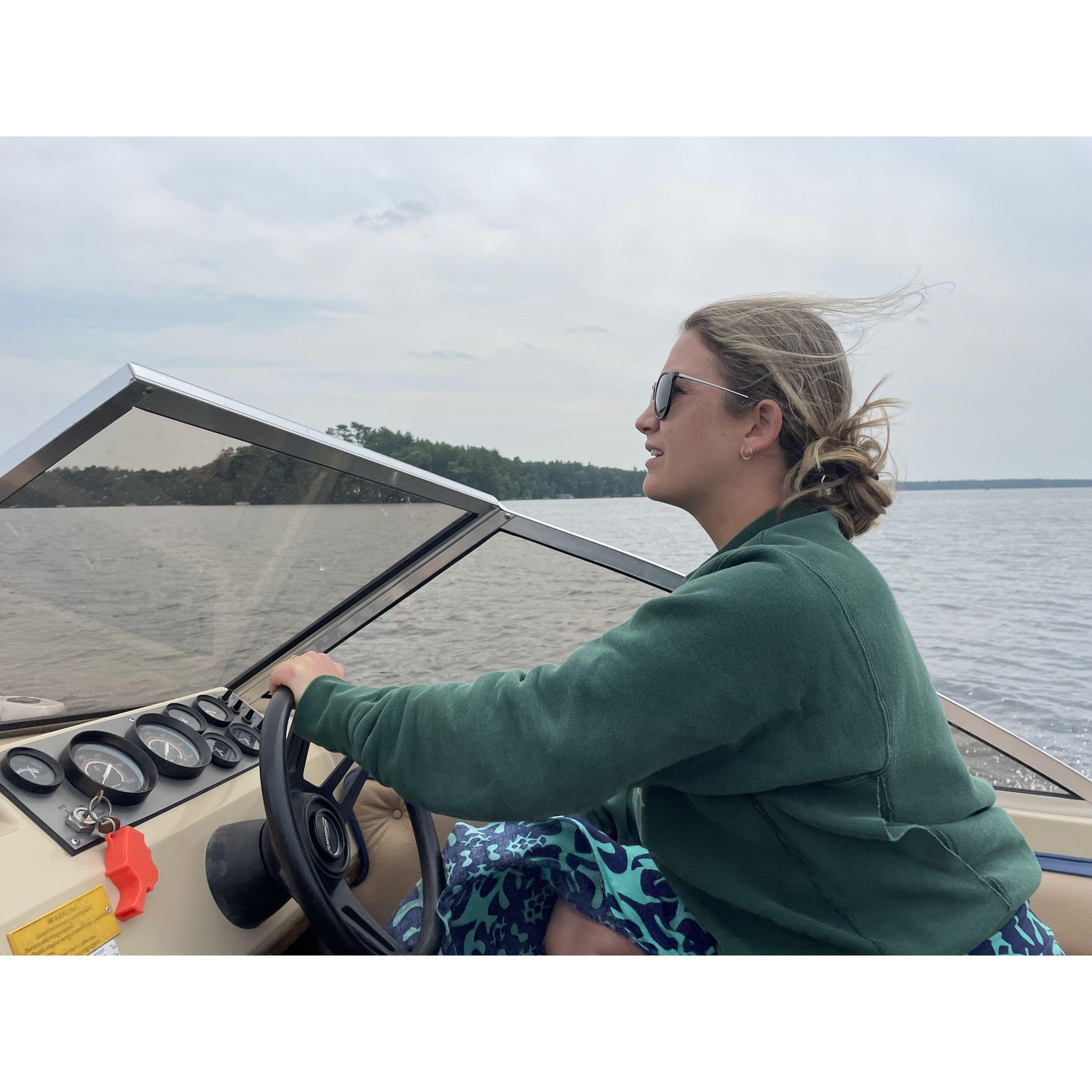 Natalie Ford behind the wheel of the Sea Squirrel, Wisconsin.