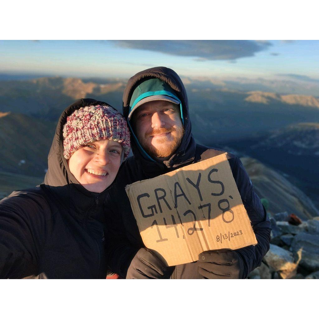 Our first 14er together at sunrise. We started the hike at 3am during the Perseids Meteor Shower then watched the sunrise come up at 14,000 ft of elevation. It was an incredible experience!
