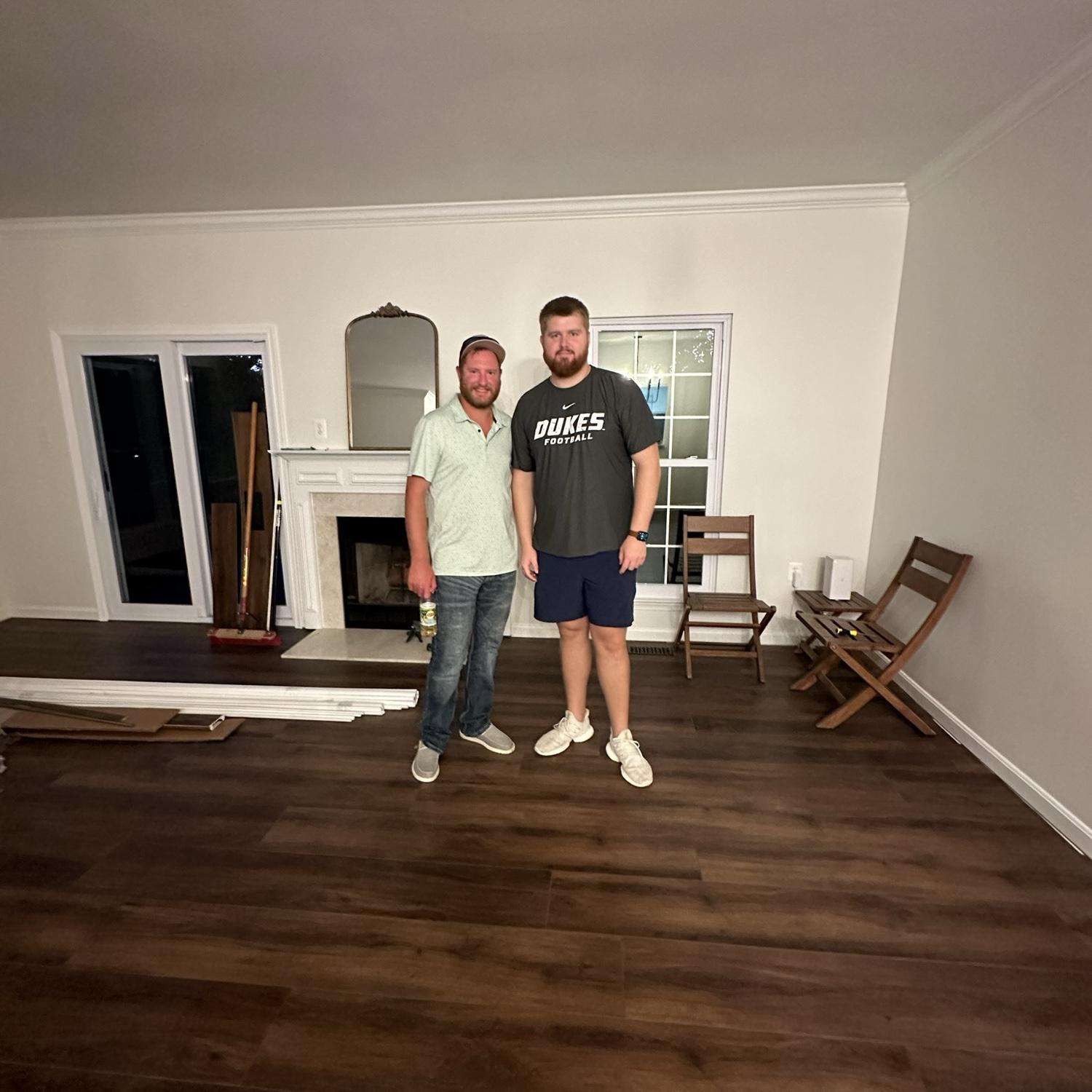 Hayden was put to work on his first Virginia trip, laying floors!