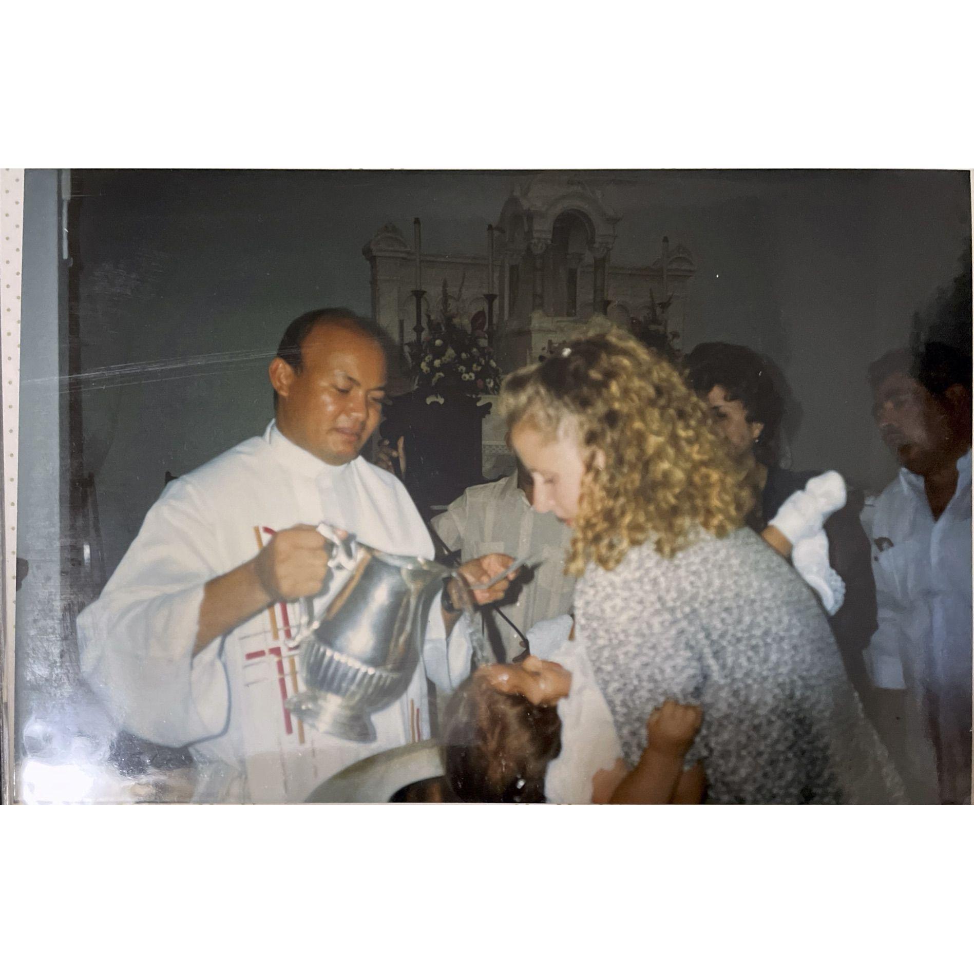 Jessica's baptism at Parroquia Nuestra Señora del Carmen in Arroyo, PR.