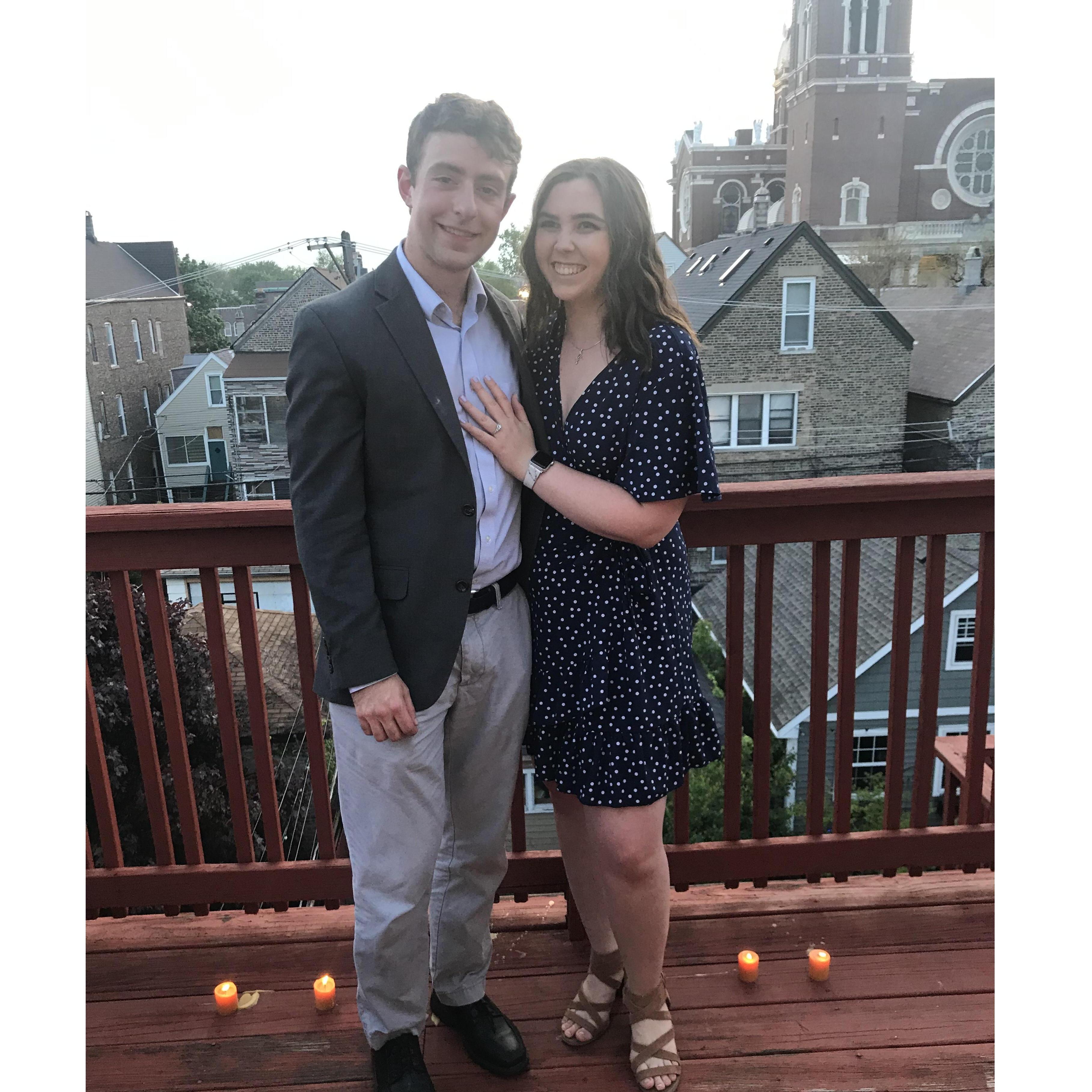 Burke proposed to Maria on his back deck with candles and champagne! He surprised (tricked) her by having a mutual friend invite her to a group dinner.