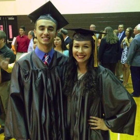 High School Graduation, 2014. You'd think one of us would wear our cap correctly