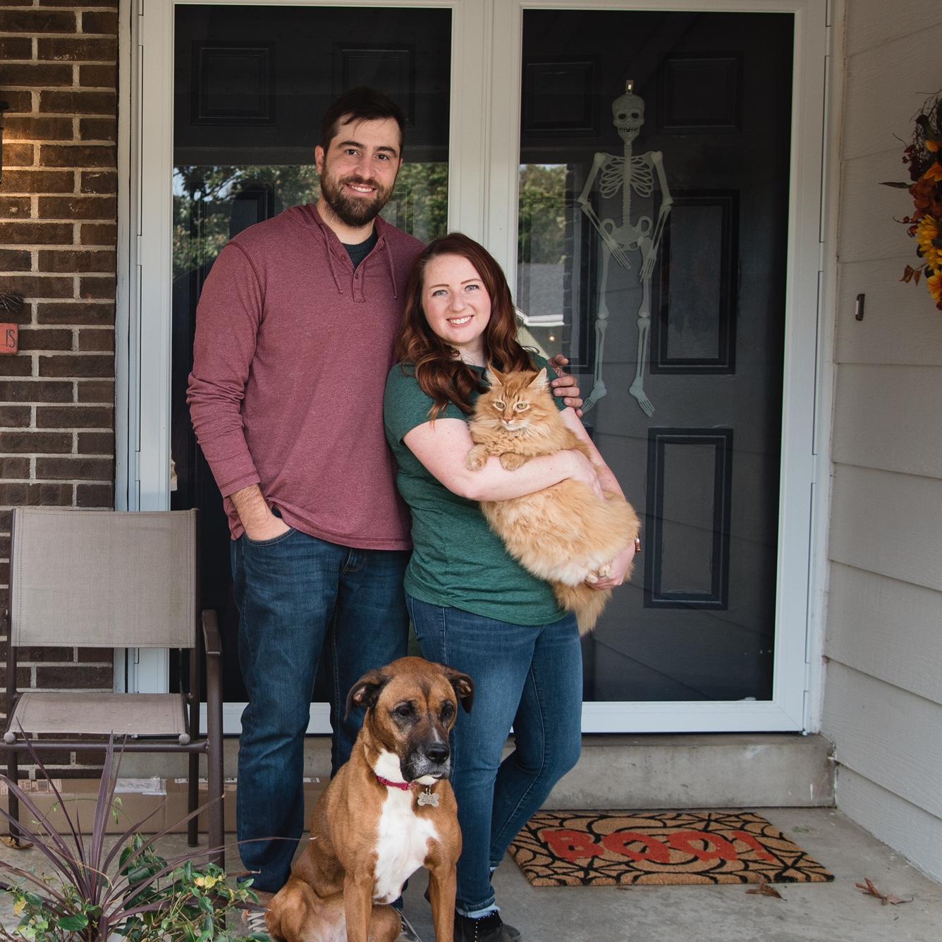 At home with our pets, Simba and Juno.