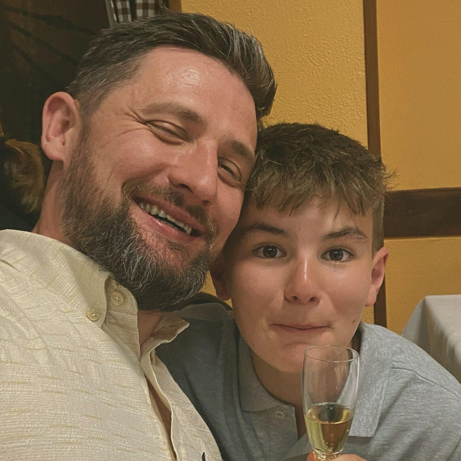 Nick & Jack having a great time together- Jack smelling champagne for the first time!!