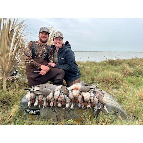 Tracy's first successful duck hunt. She still promises to go once a year.